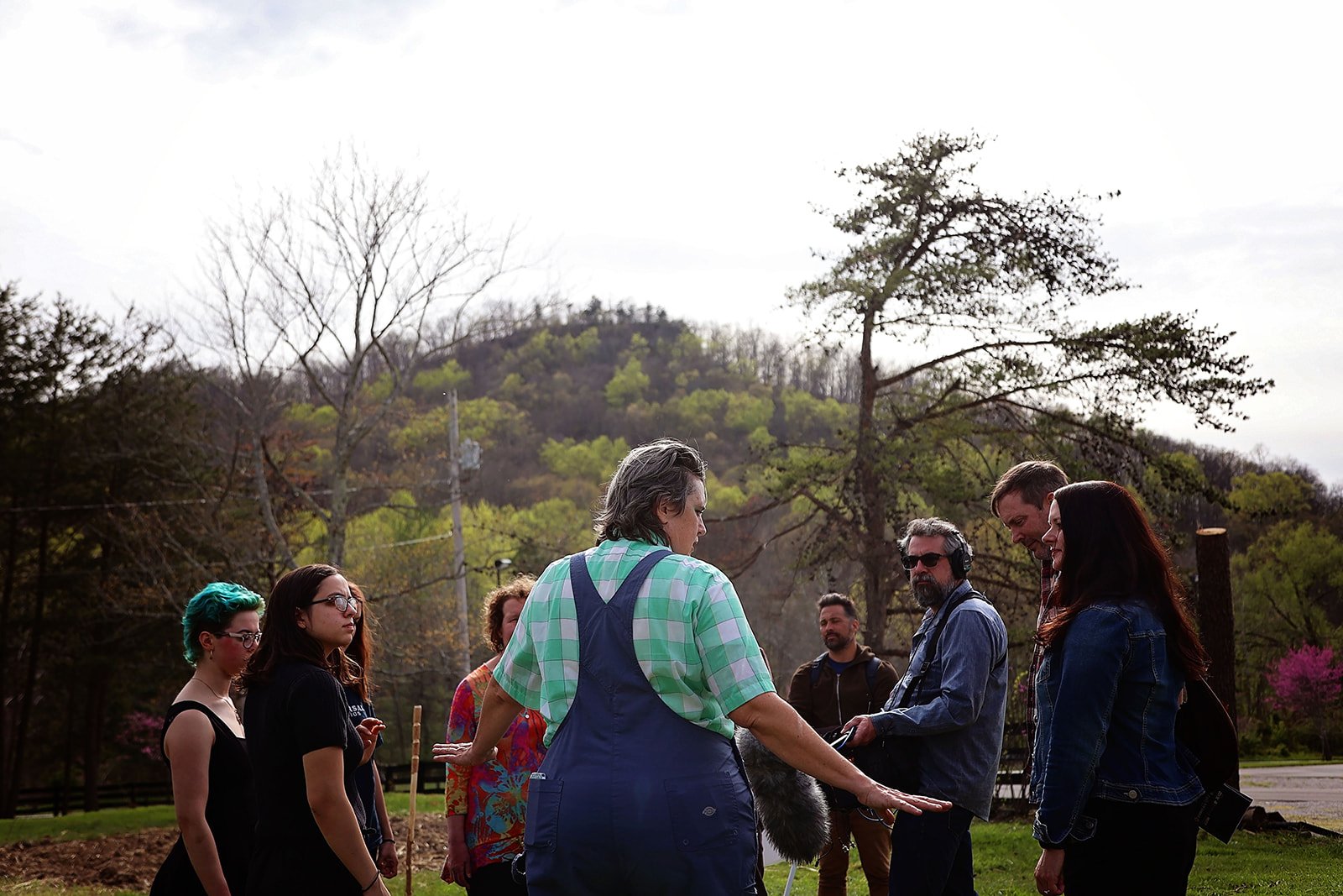  Nicole Garneau performs as guide for Ezell: Ballad of a Land Man, March 2022, Berea College Forestry Center. Photo: Erica Chambers.  