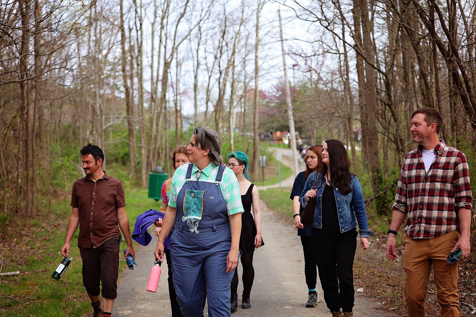  Nicole Garneau performs as guide for Ezell: Ballad of a Land Man, March 2022, Berea College Forestry Center. Photo: Erica Chambers.  