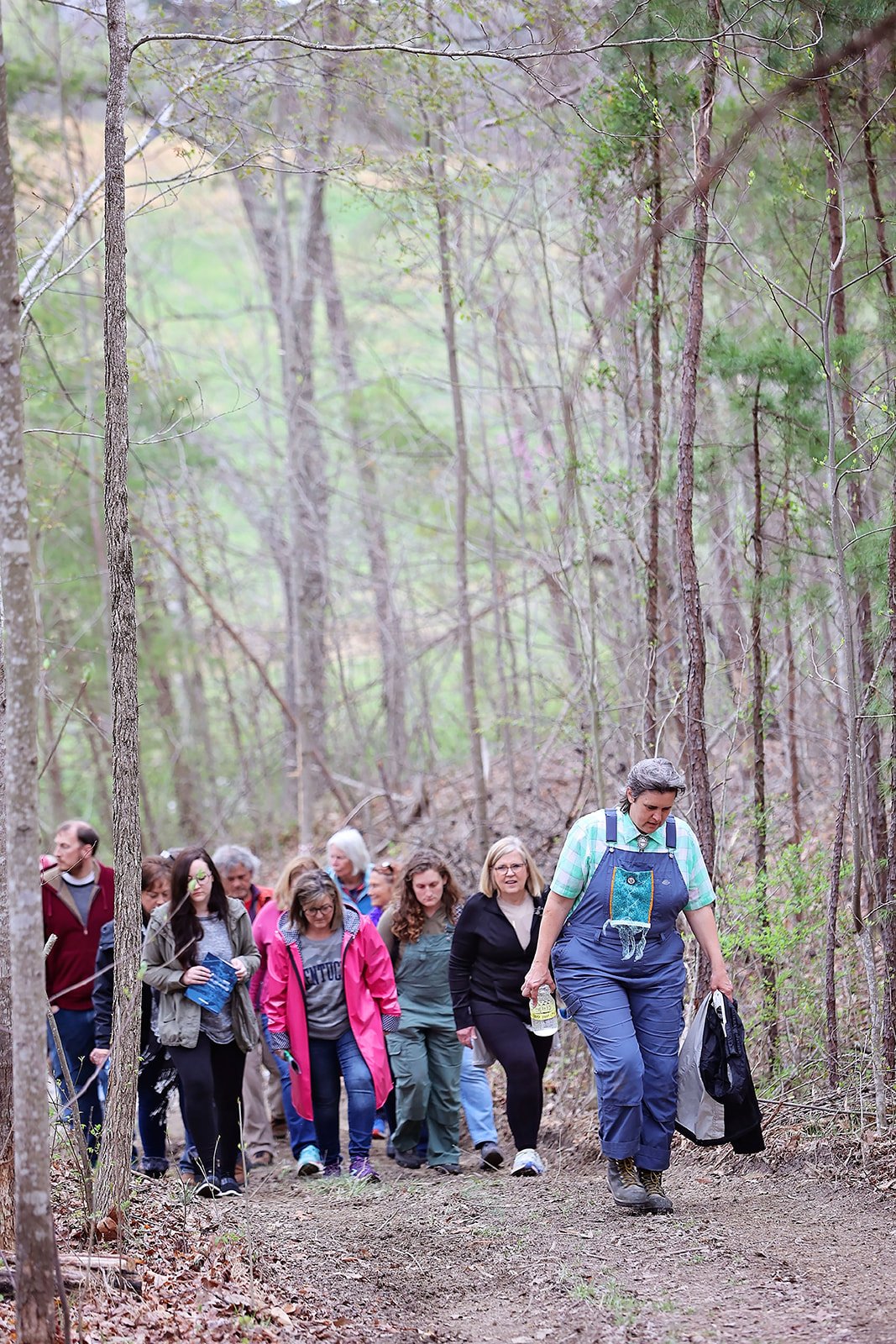  Nicole Garneau performs as guide for Ezell: Ballad of a Land Man, March 2022, Berea College Forestry Center. Photo: Erica Chambers.    