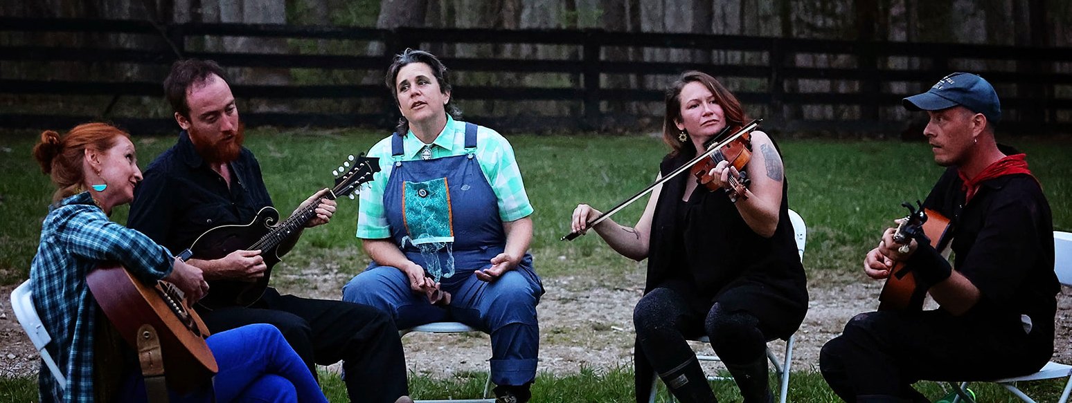  Singers &amp; musicians of Ezell: Ballad of a Land Man. Faye Adams-Eaton, Jacob Mudd, Nicole Garneau, Anna Harrod, and Cory Shenk at Berea College Forestry Center, March 2022. Photo: Erica Chambers.    