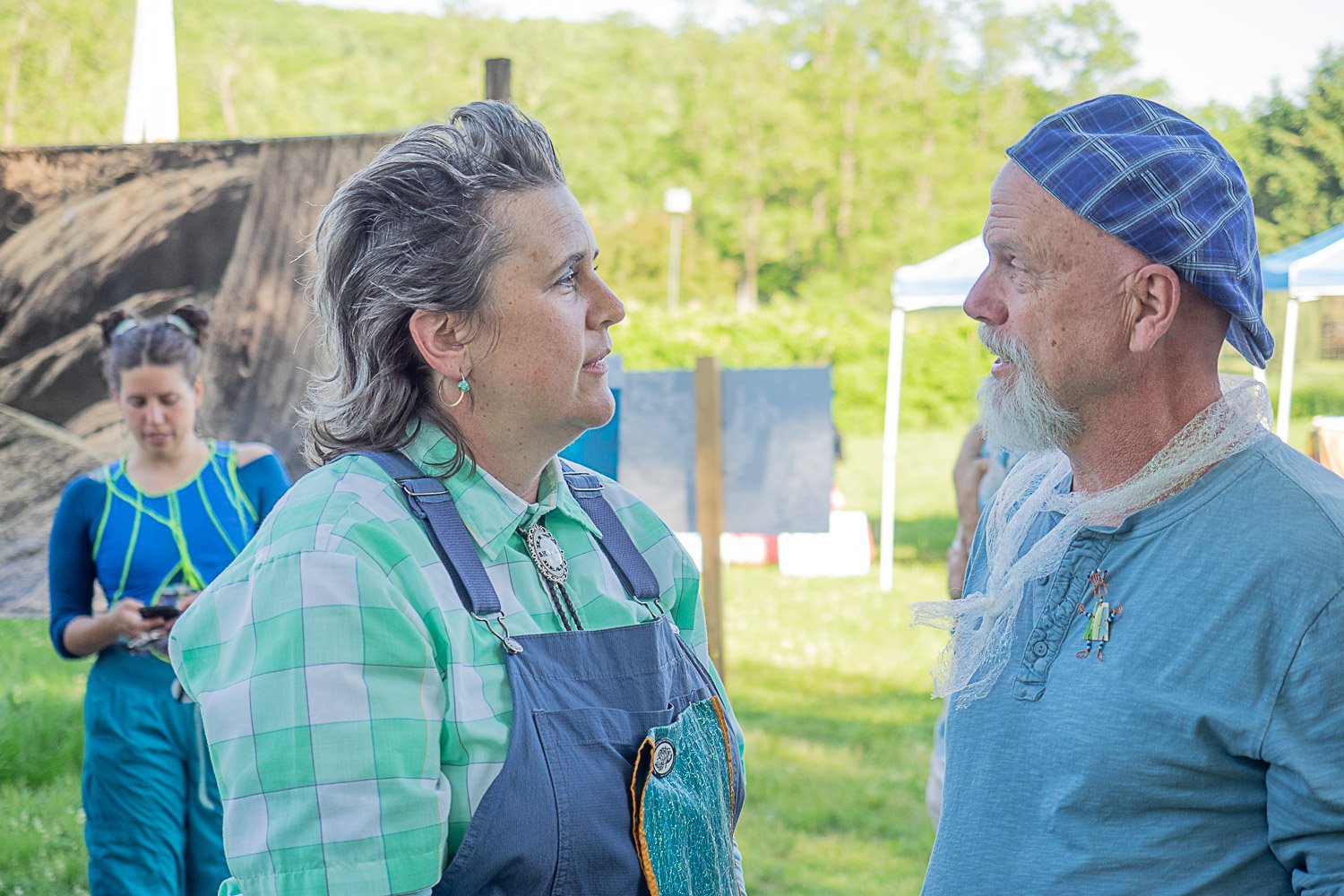  Nicole Garneau and John Roth perform as guides for Ezell: Ballad of a Land Man, June 2022 at Farm Arts Collective. Photo: Kent Fairfield.   