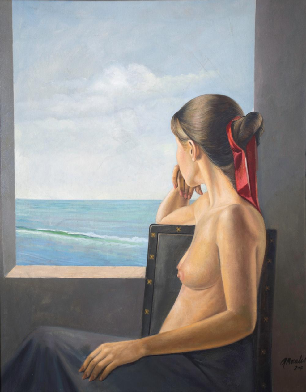 Joven viendo al mar