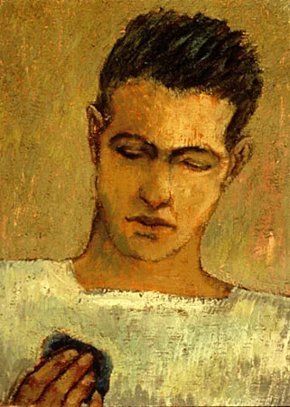 Man with a small blue object