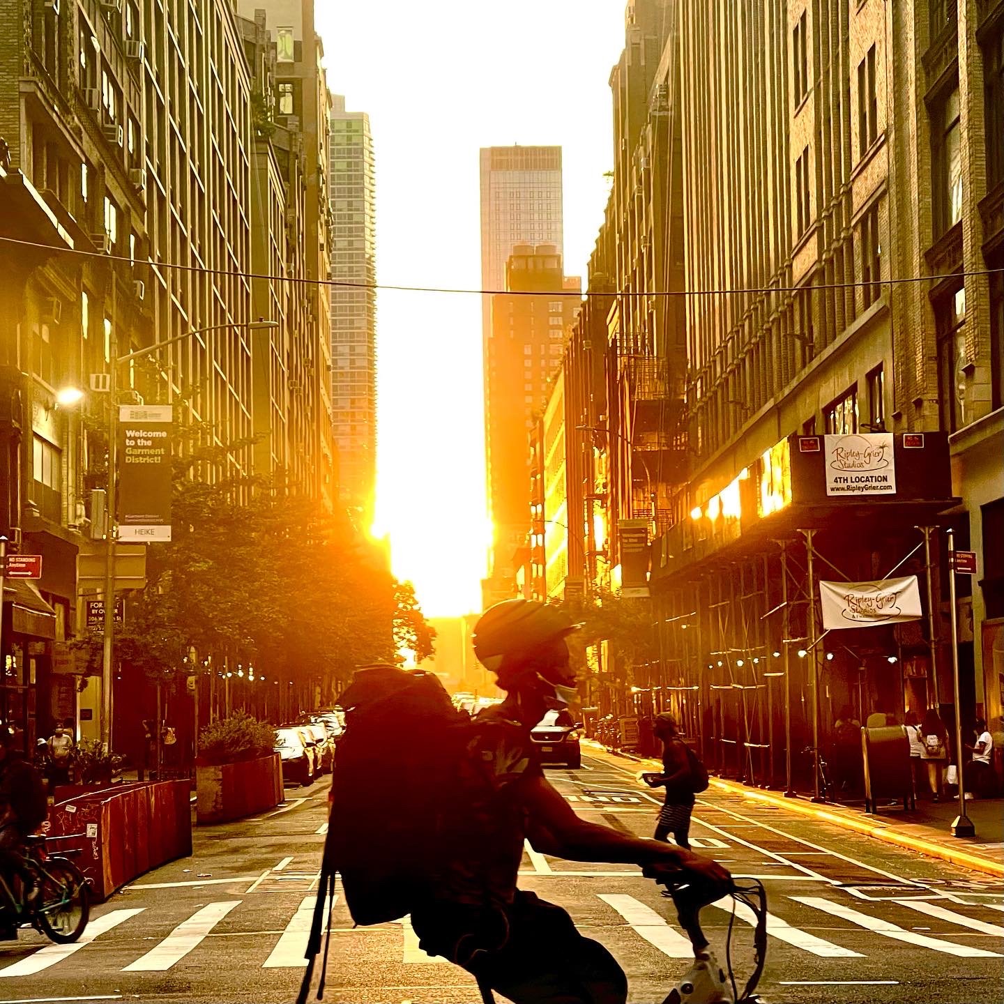 Cyclist at sunset, Midtown