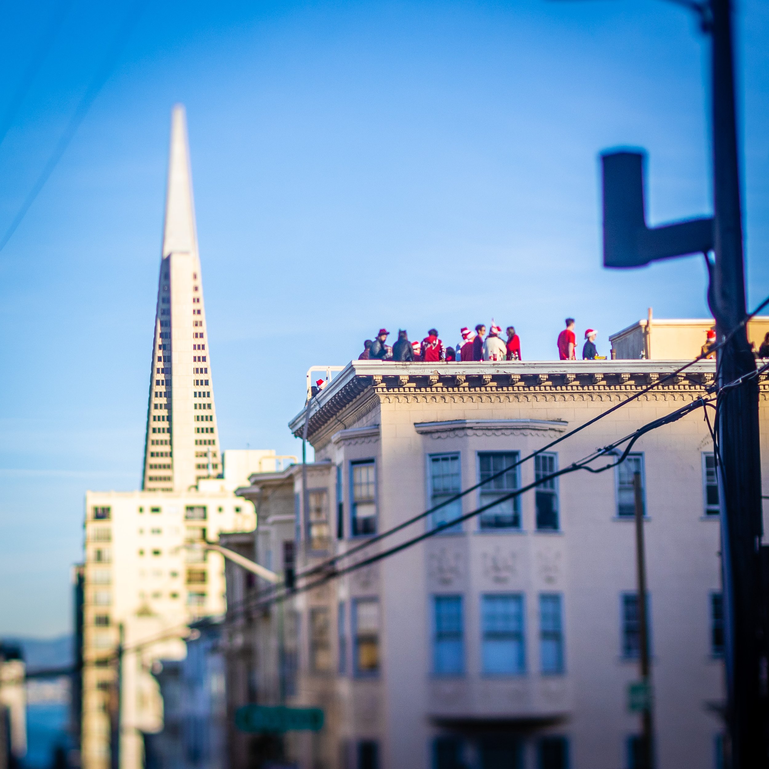 Rooftop party through tilt-shift lens, San Francisco