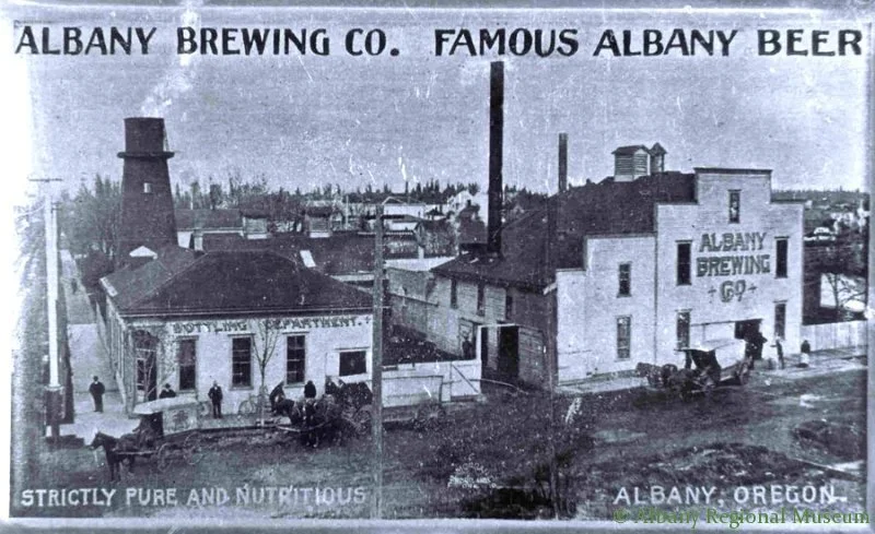This ashtray advertised Albany Brewing Co, located on the NE corner of Ninth and Lyon. It reads "Albany Brewing Co. Famous Albany Beer; Strictly pure and nutritious; Albany, Oregon." The location is now covered by the overpass leading down to Lyon. c. 1900