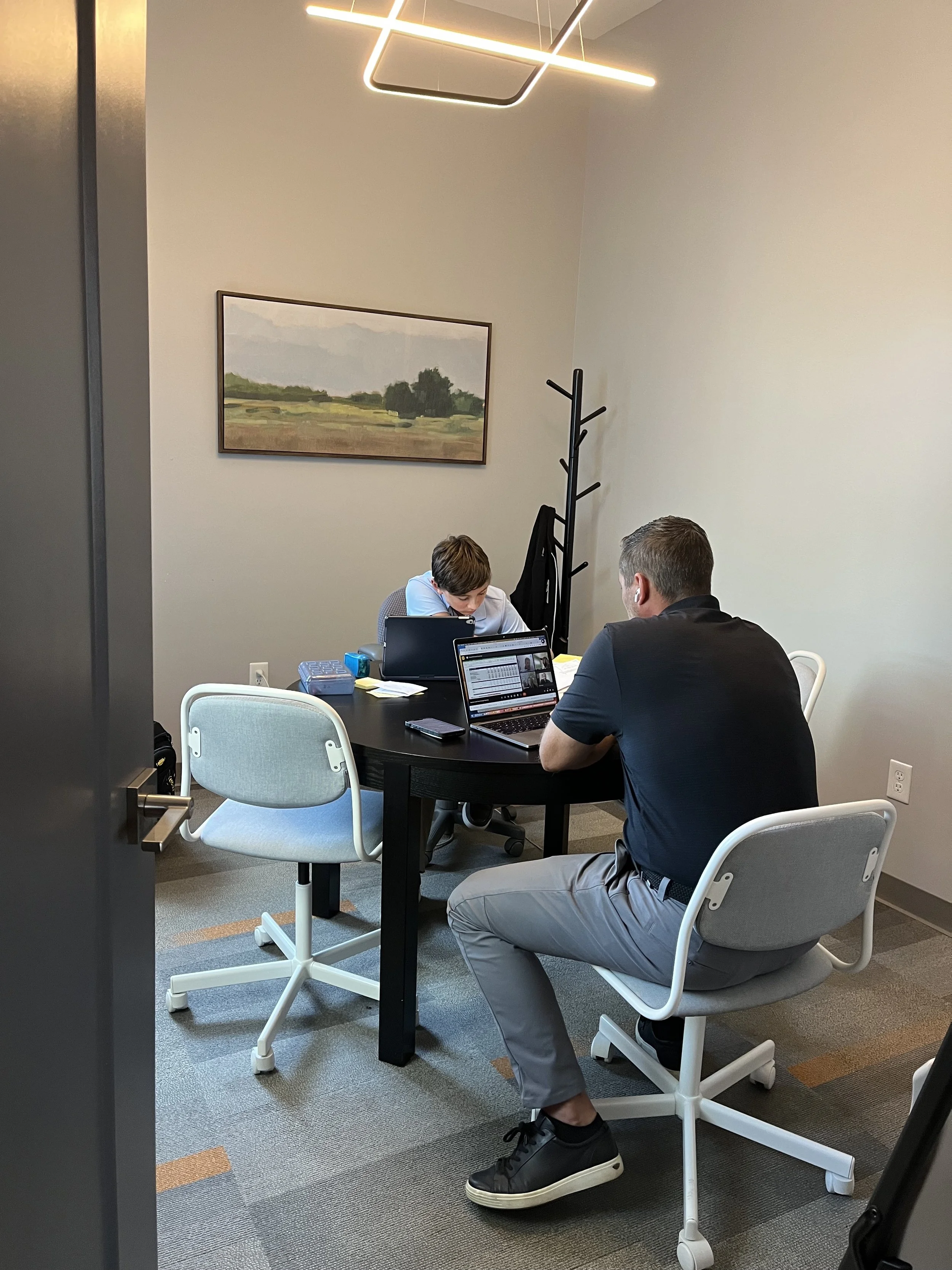 Rex and Daniel in office.jpg