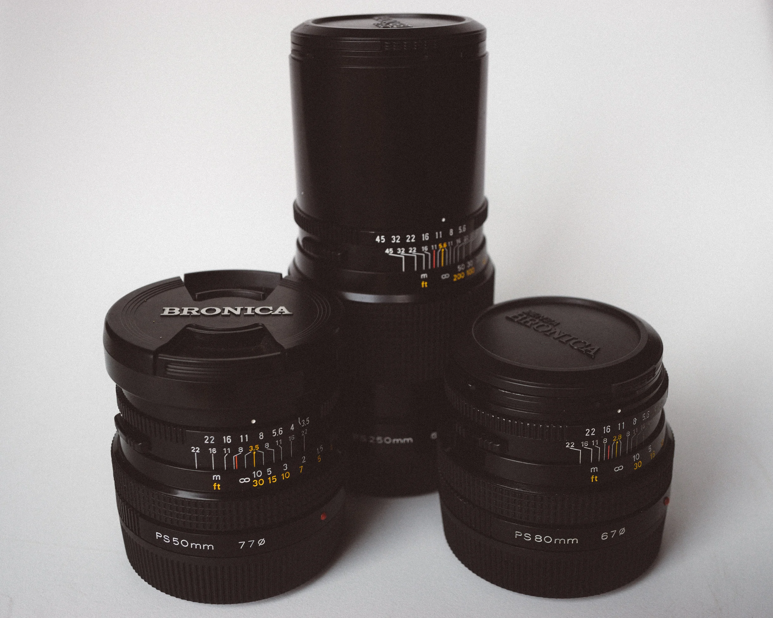 50mm f/3.5, 80mm f/2.8 and 250mm f/5.6 lenses.