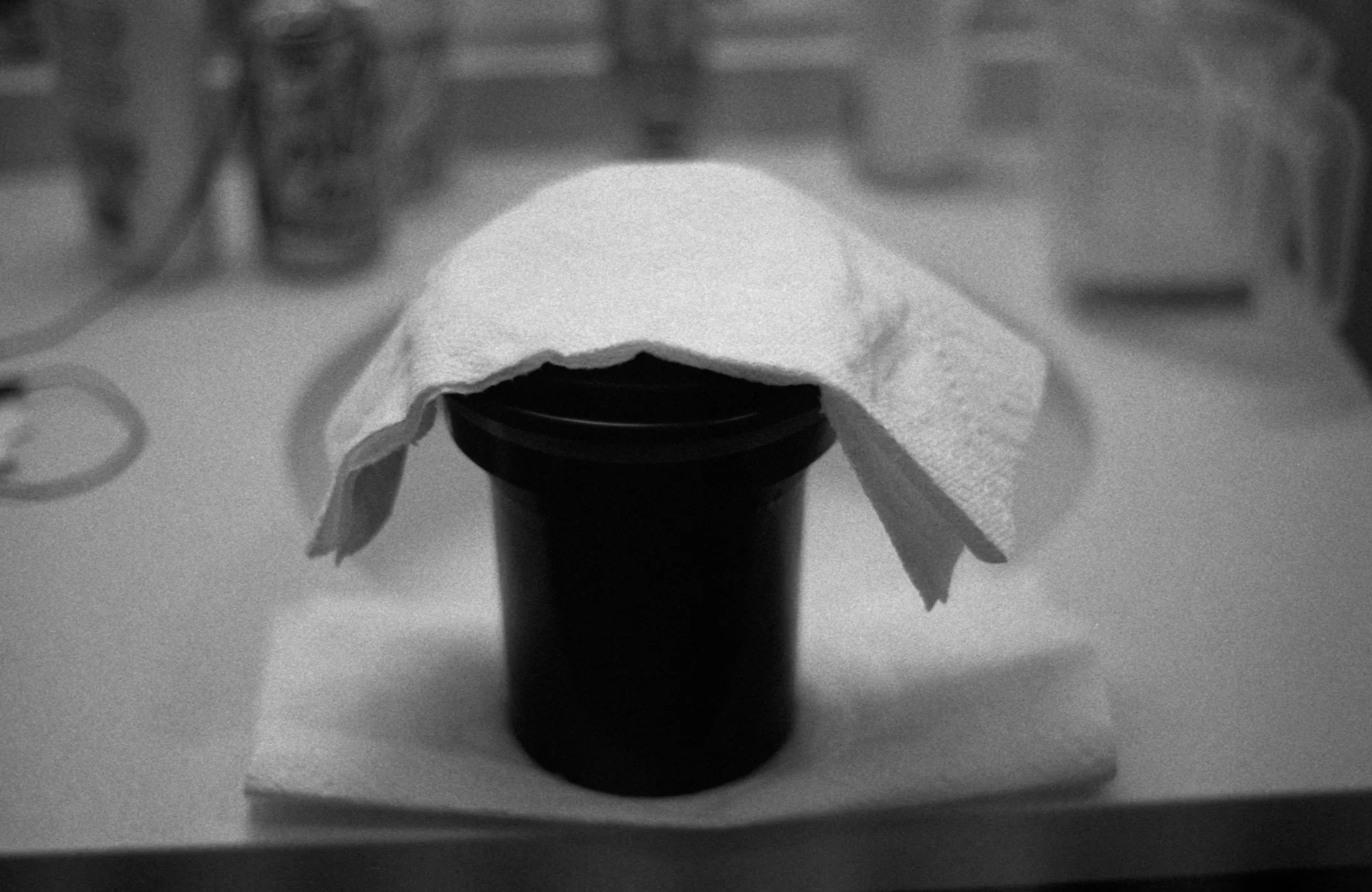 Developing film at home with a Patterson tank, shot with a Minolta XGM on HP5+ @ 1600