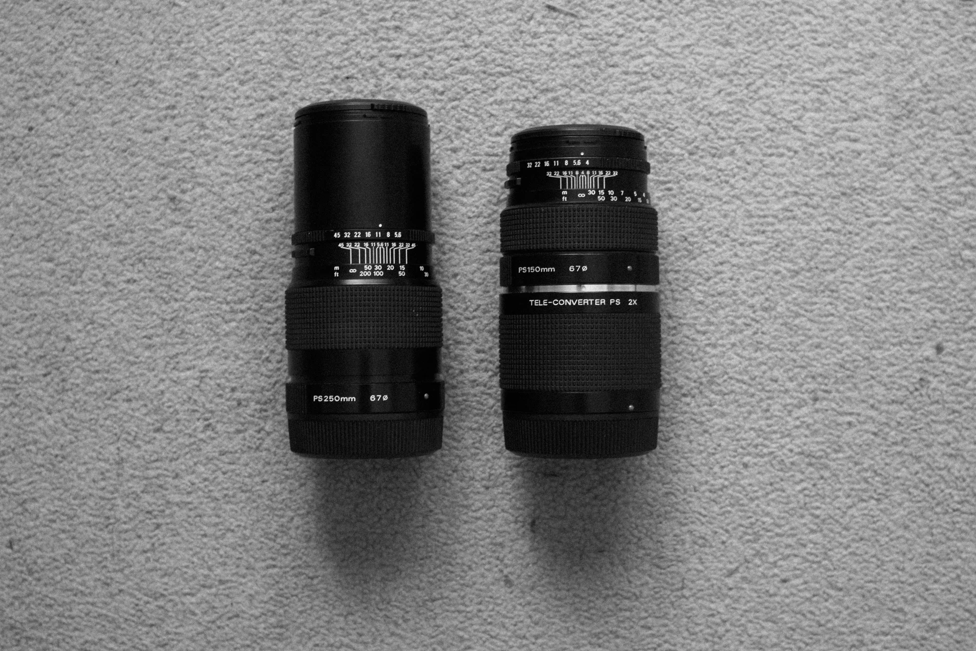 250mm vs 2x Teleconverter + 150mm f/4 lens: pretty much the same size