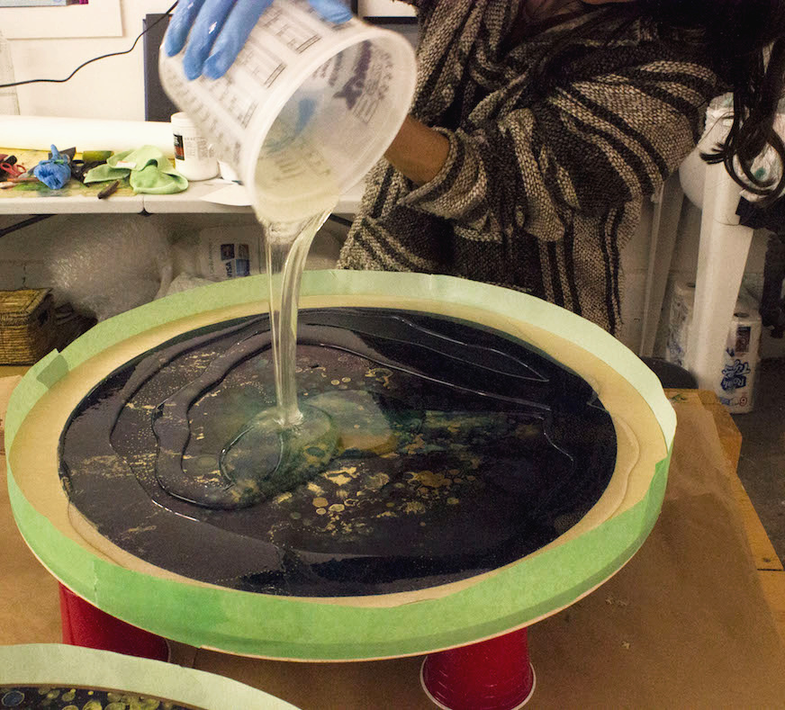 Pouring resin.