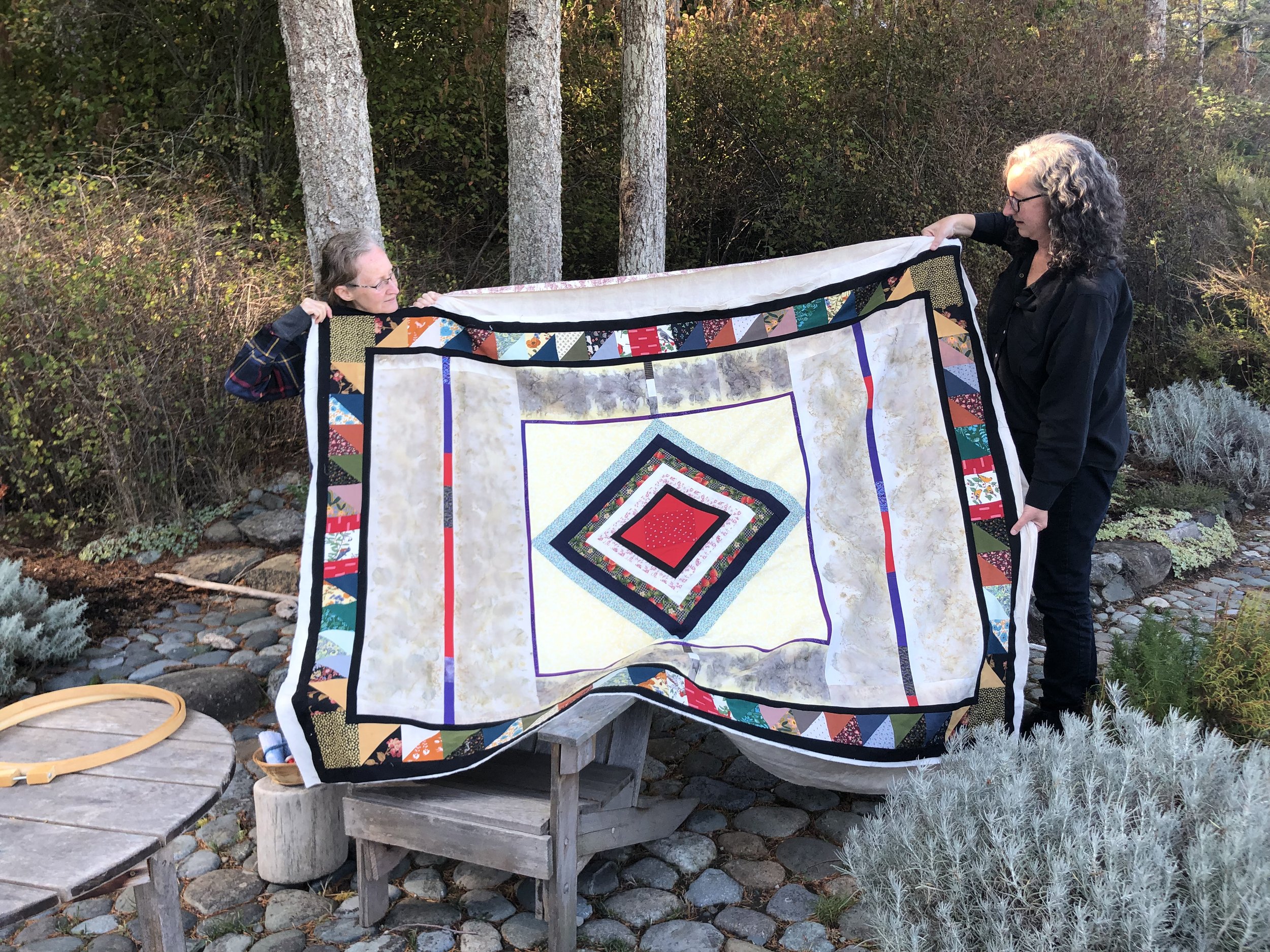 MG, Amy and Rosemary holding the quilt.jpg