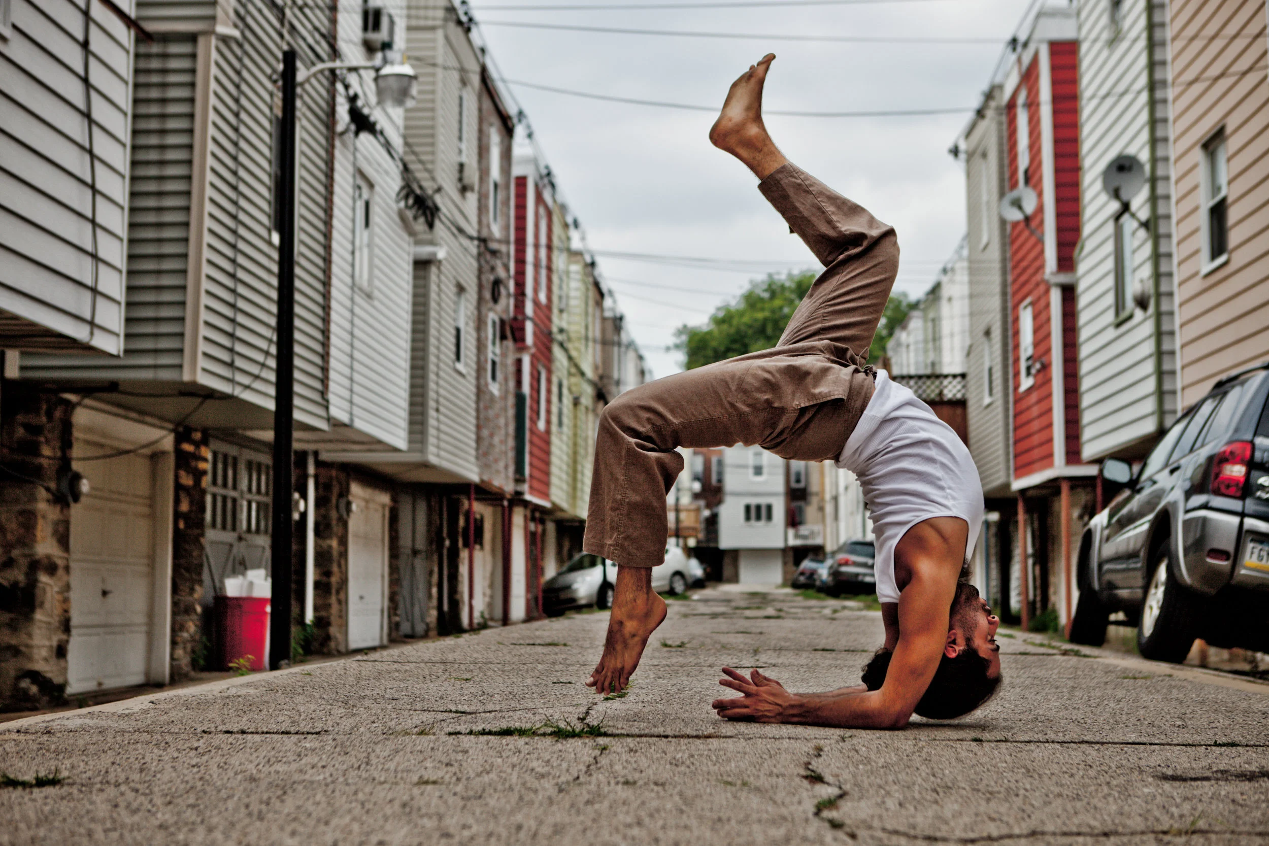 When Noah and I first started creating in 2012 he was a little shy and needed a little coaxing in front of the camera. As you can see from the images the shyness only lasted about 15 minutes. By the end of our first shoot, I was making requests for one-handed handstands and playing in the middle of the road. Needless to say over the years Noah has become an amazing friend and teacher. Enjoy the stroll down memory lane. If you are interested in learning how to grow your yoga and movement practice check out Noah's offerings at The Yoga and Movement Sanctuary.