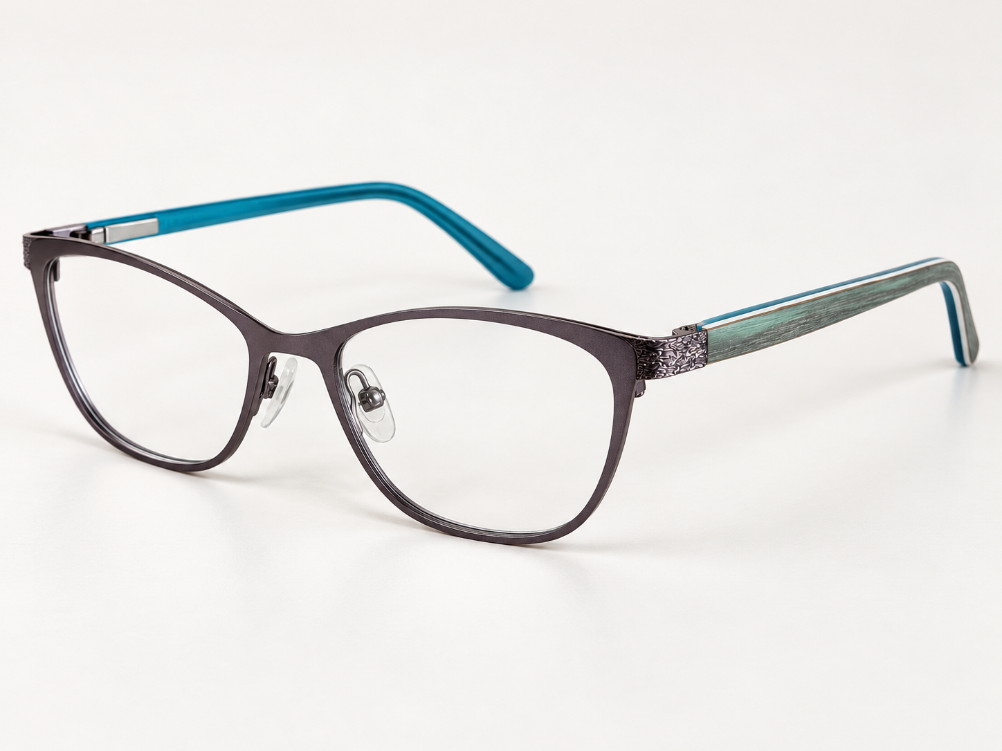 Angled view of OMG! 6030 C3 reading glasses showing decorative hinges and teal arms