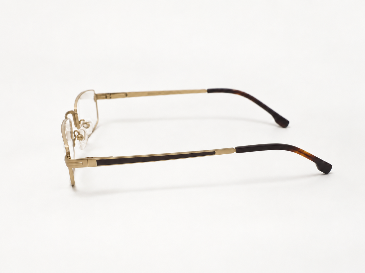 Side view of Julian Beaumont 3659 glasses showing the gold temple and dark inlay