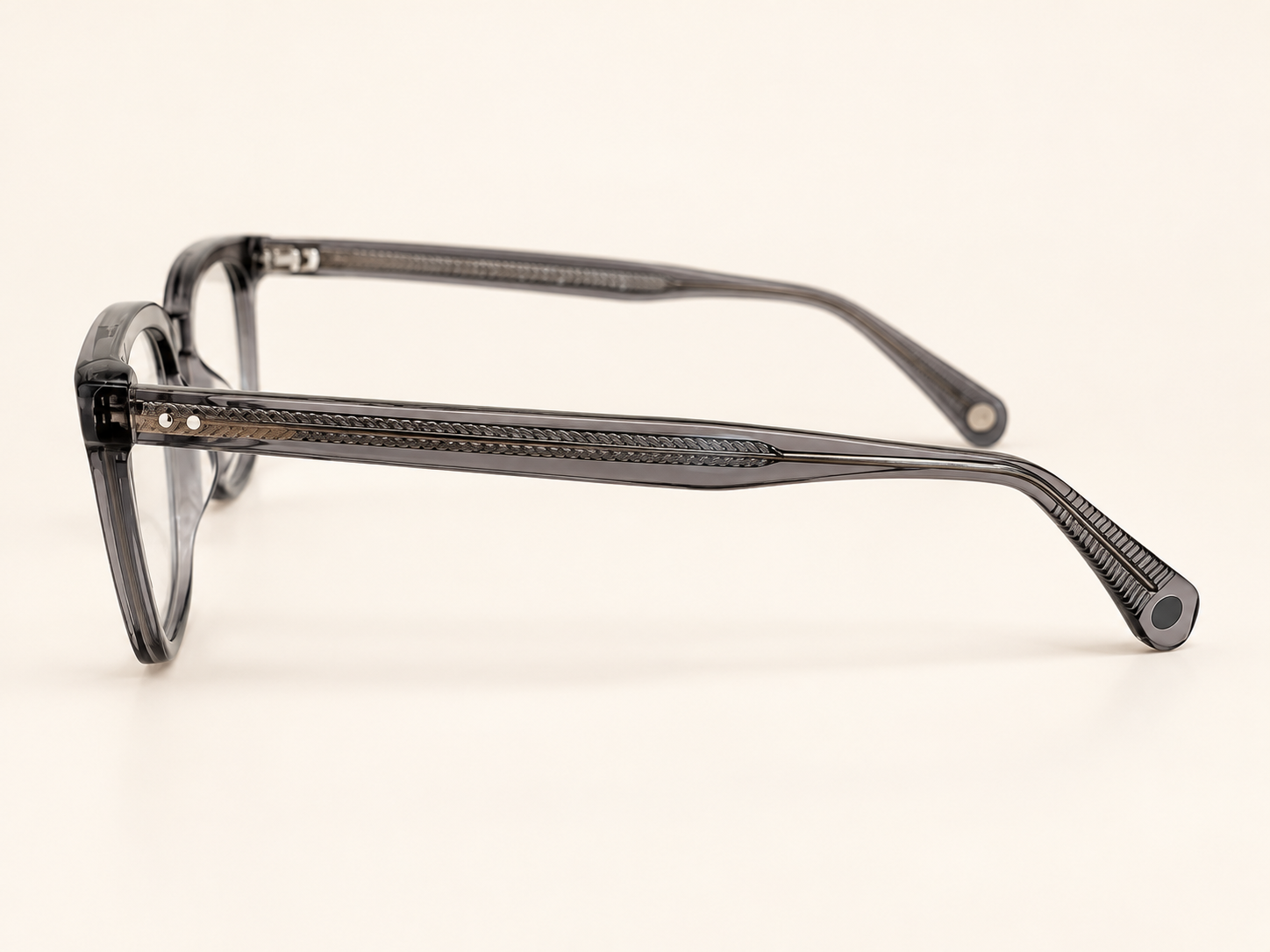Side view of Jacob Stone JS811 grey reading glasses showing the patterned metal core and curved arm tip
