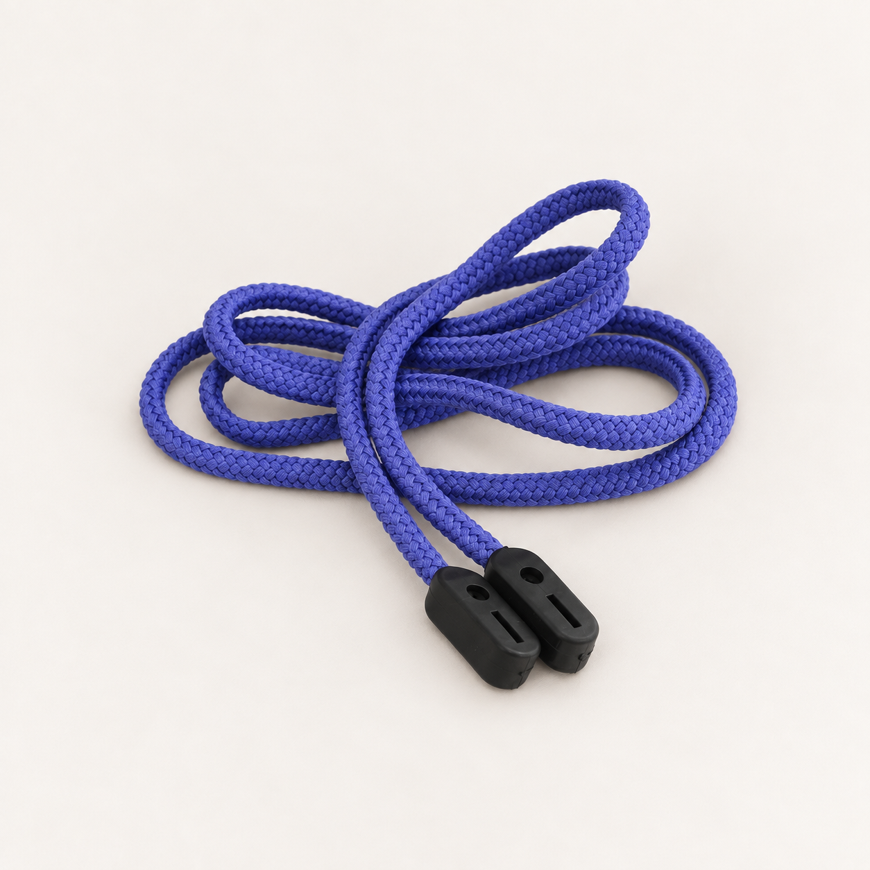 Blue-violet braided glasses cord in loose loops with two black rubber grip ends