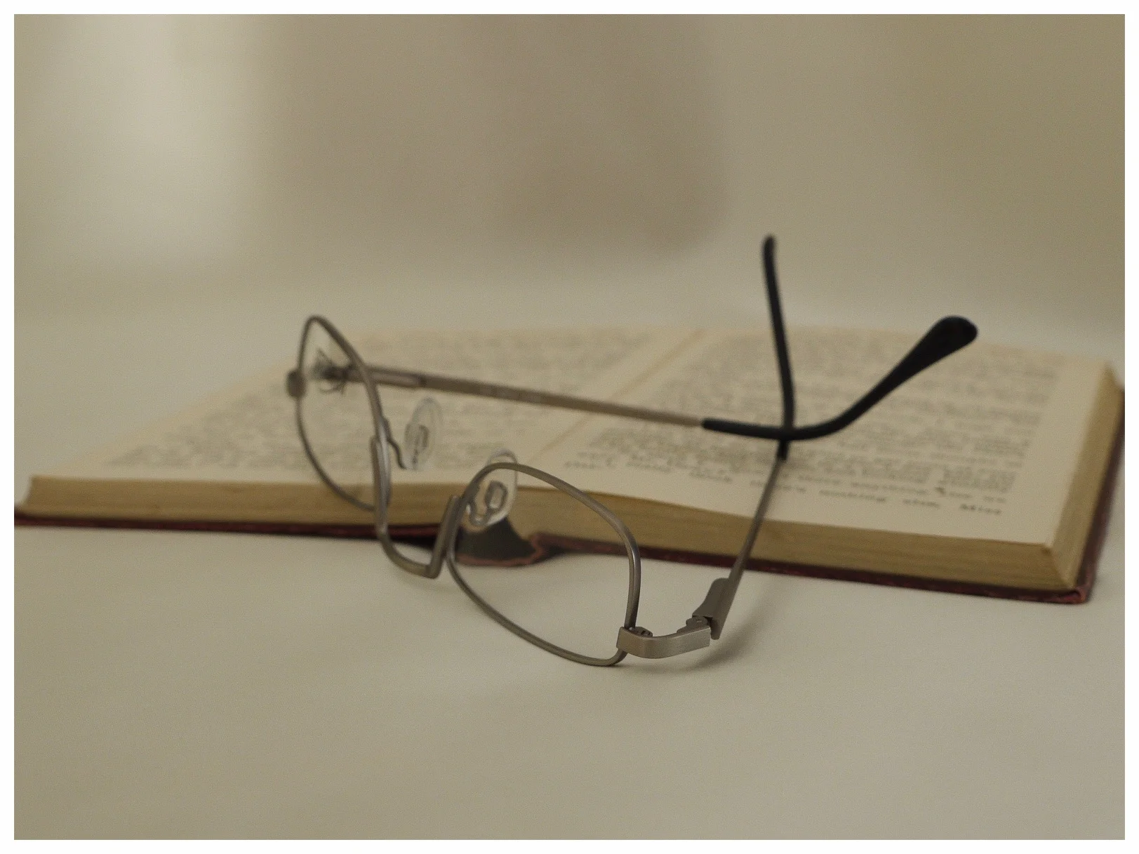 pair reading glasses, half, frame, silver, book