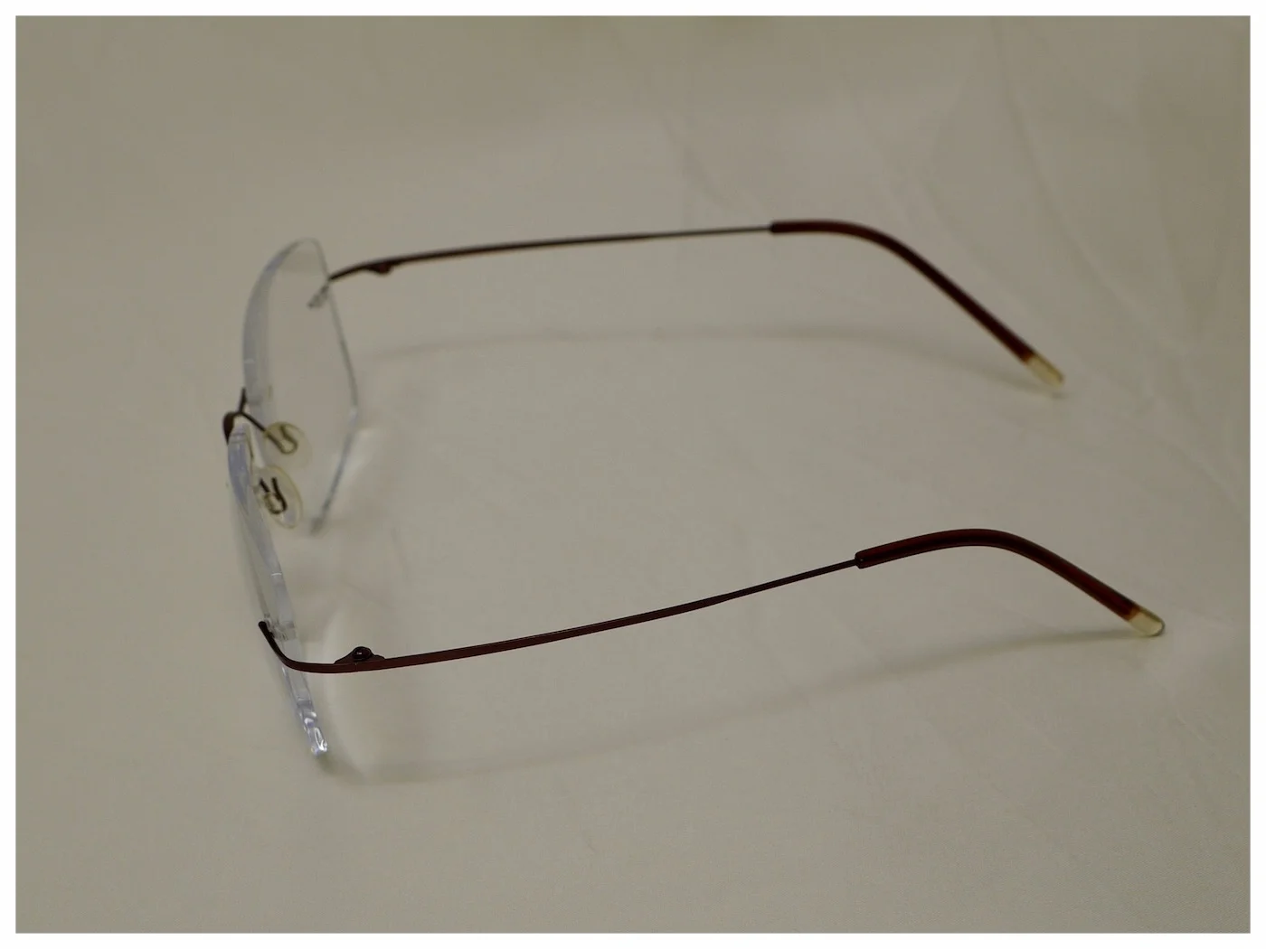 reading glasses with larger size rimless lenses