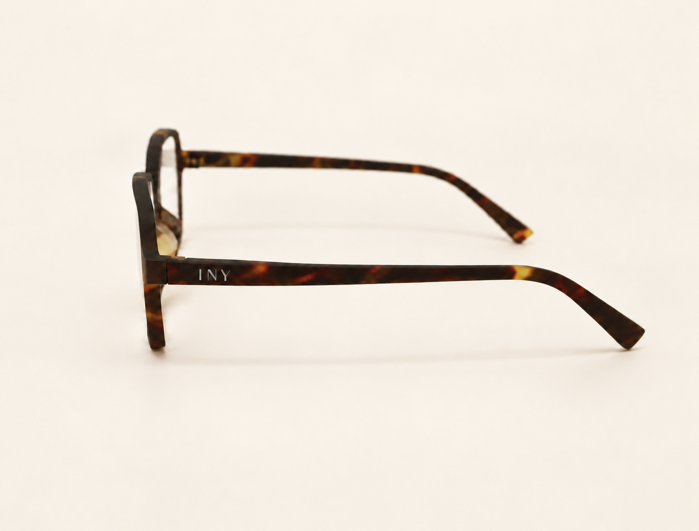 Side view of Greta Havana reading glasses showing the narrow temple and curved tip