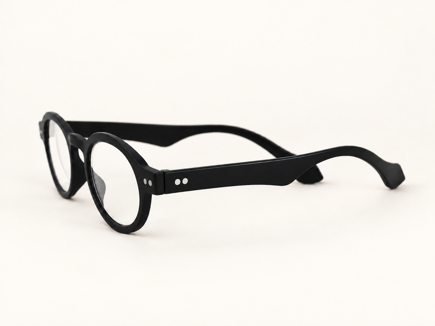 Three-quarter side view of Doctor black reading glasses showing the broad temples and silver pins