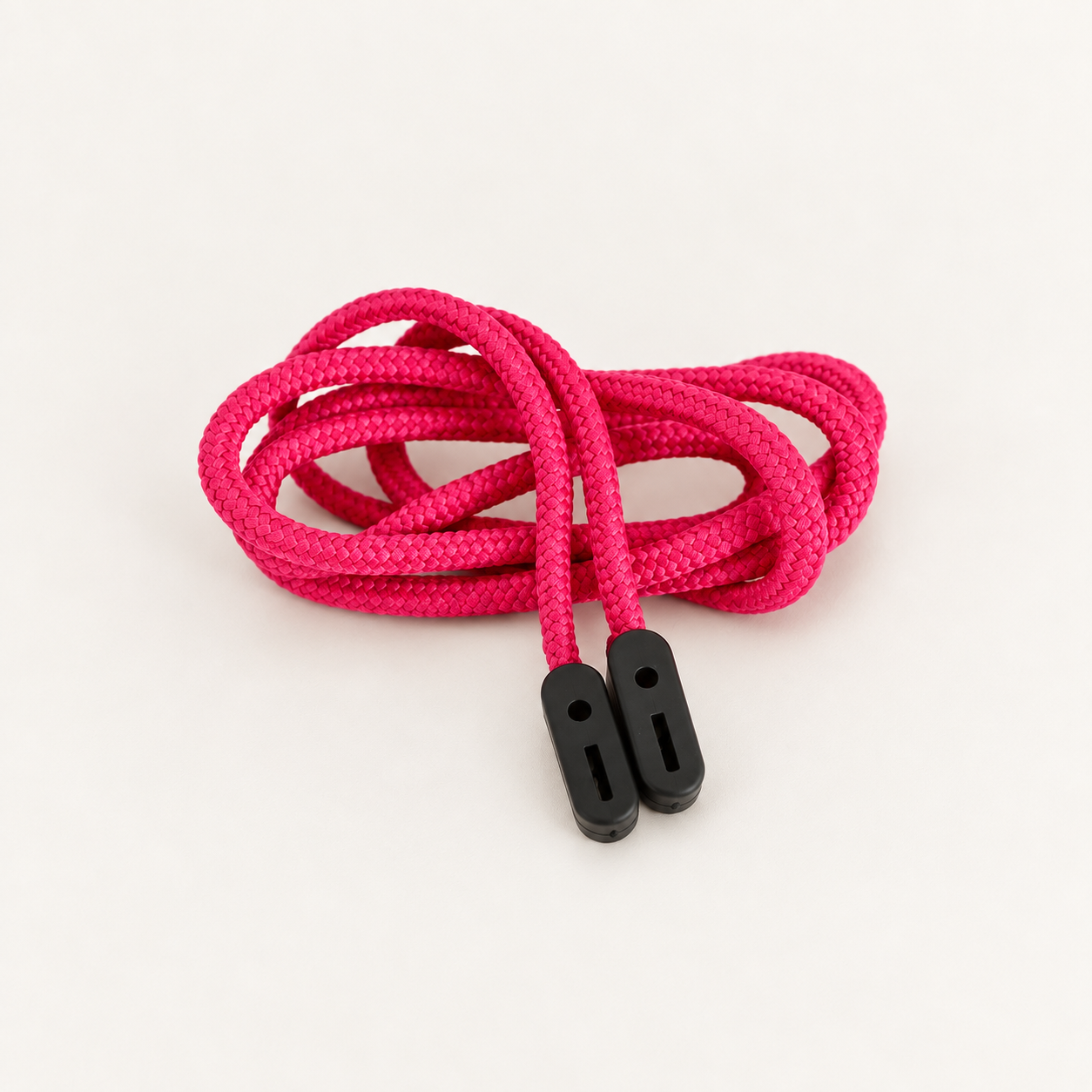 Bright pink braided glasses cord with two black rubber grip ends