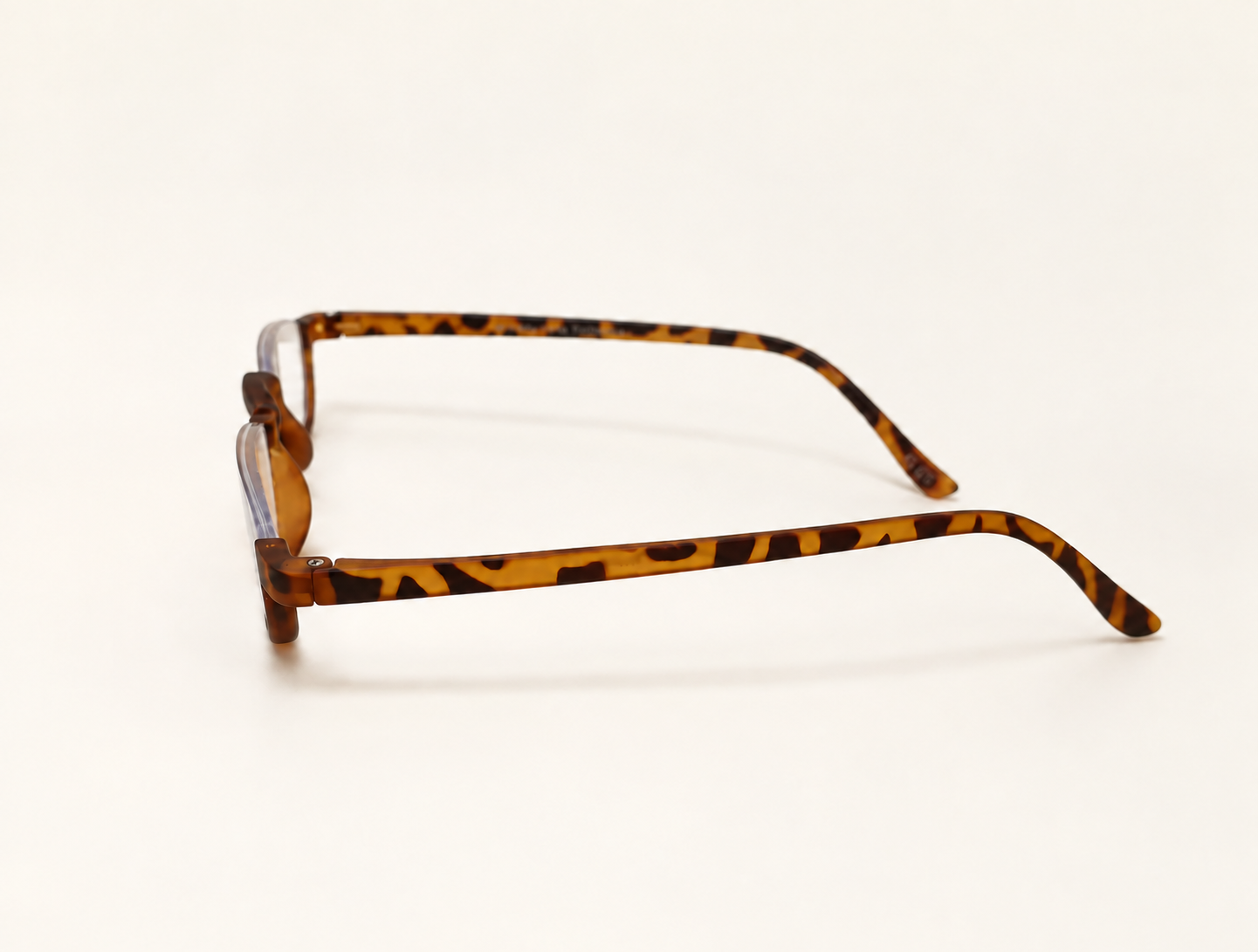 Side view of Kensington half-eye reading glasses showing the slim tortoiseshell temples