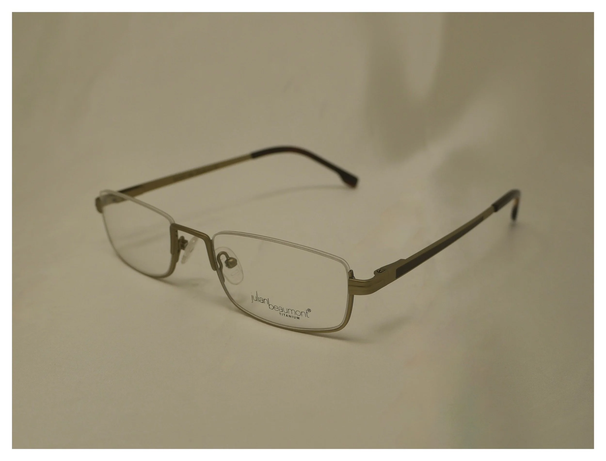 Three-quarter angle view of Julian Beaumont 3659 gold titanium half-eye reading glasses