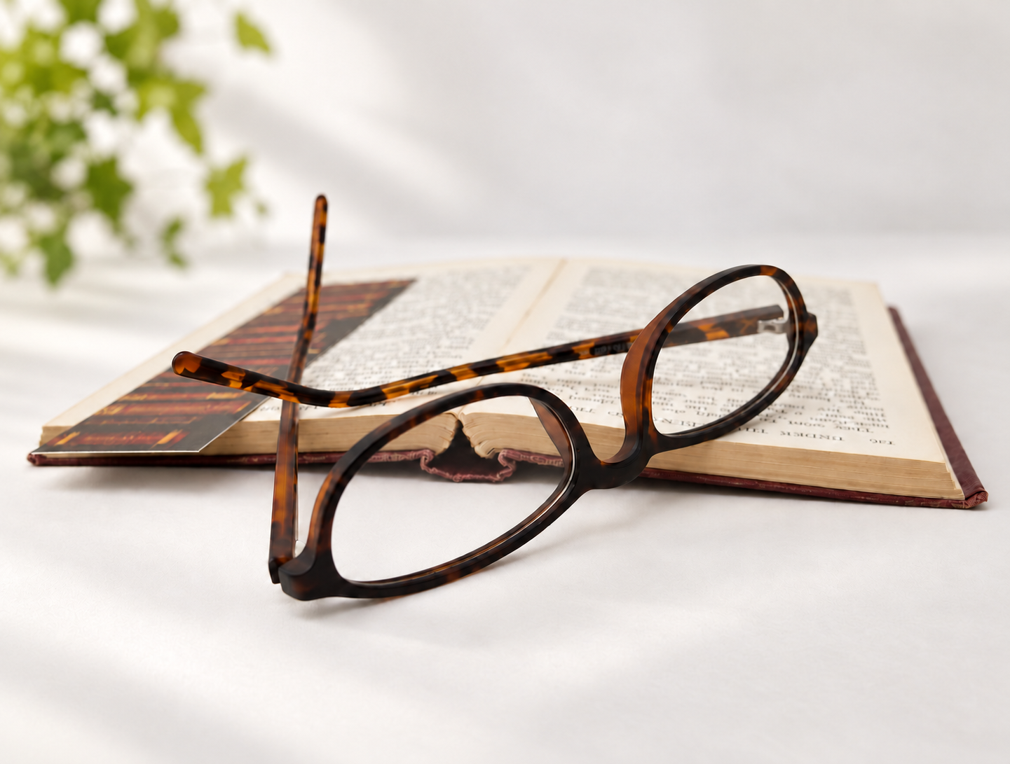CP-131AR half-eye reading glasses beside an open book