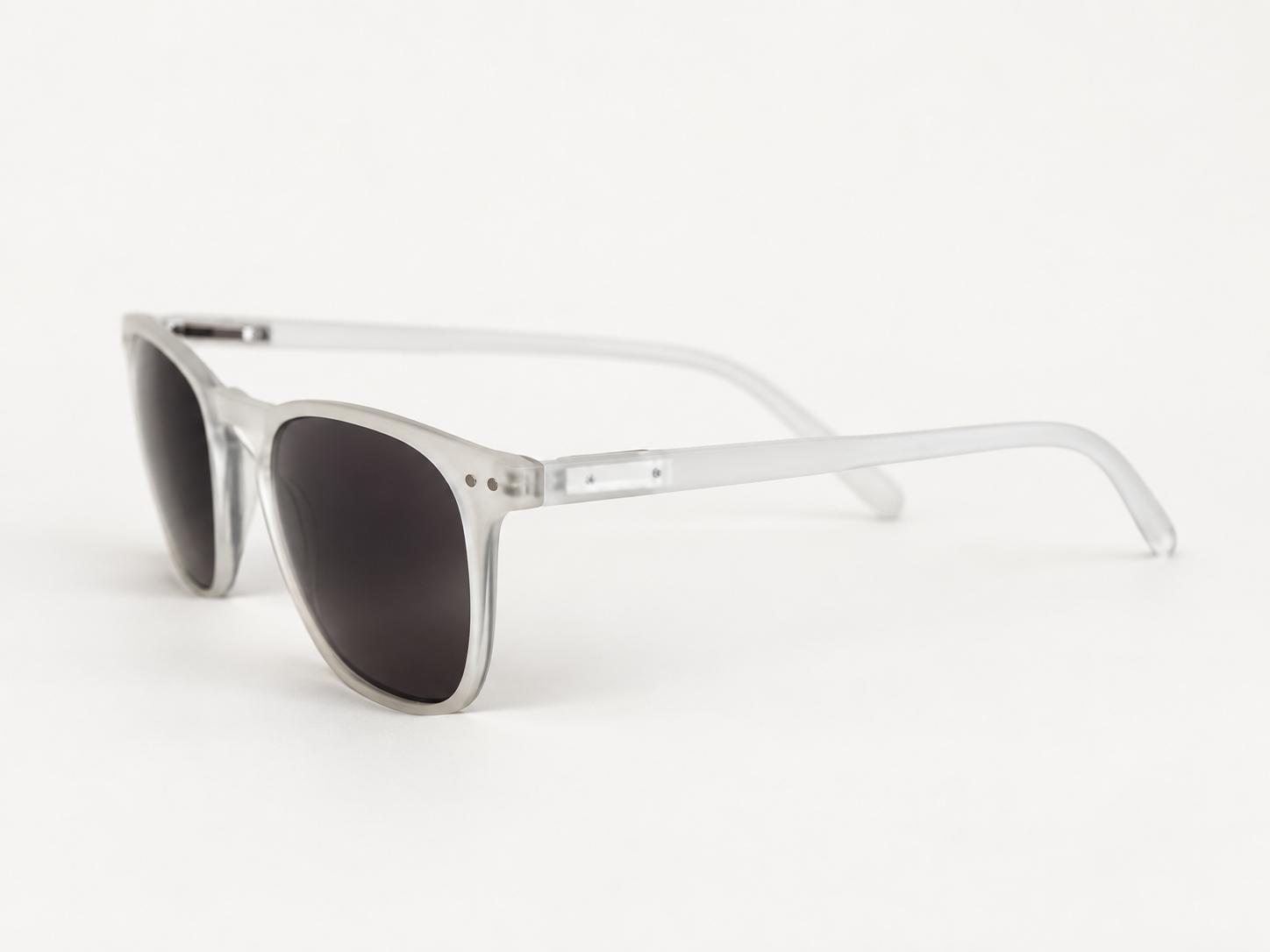 Side view of Playa Crystal sun reading glasses showing the translucent arm and hinge