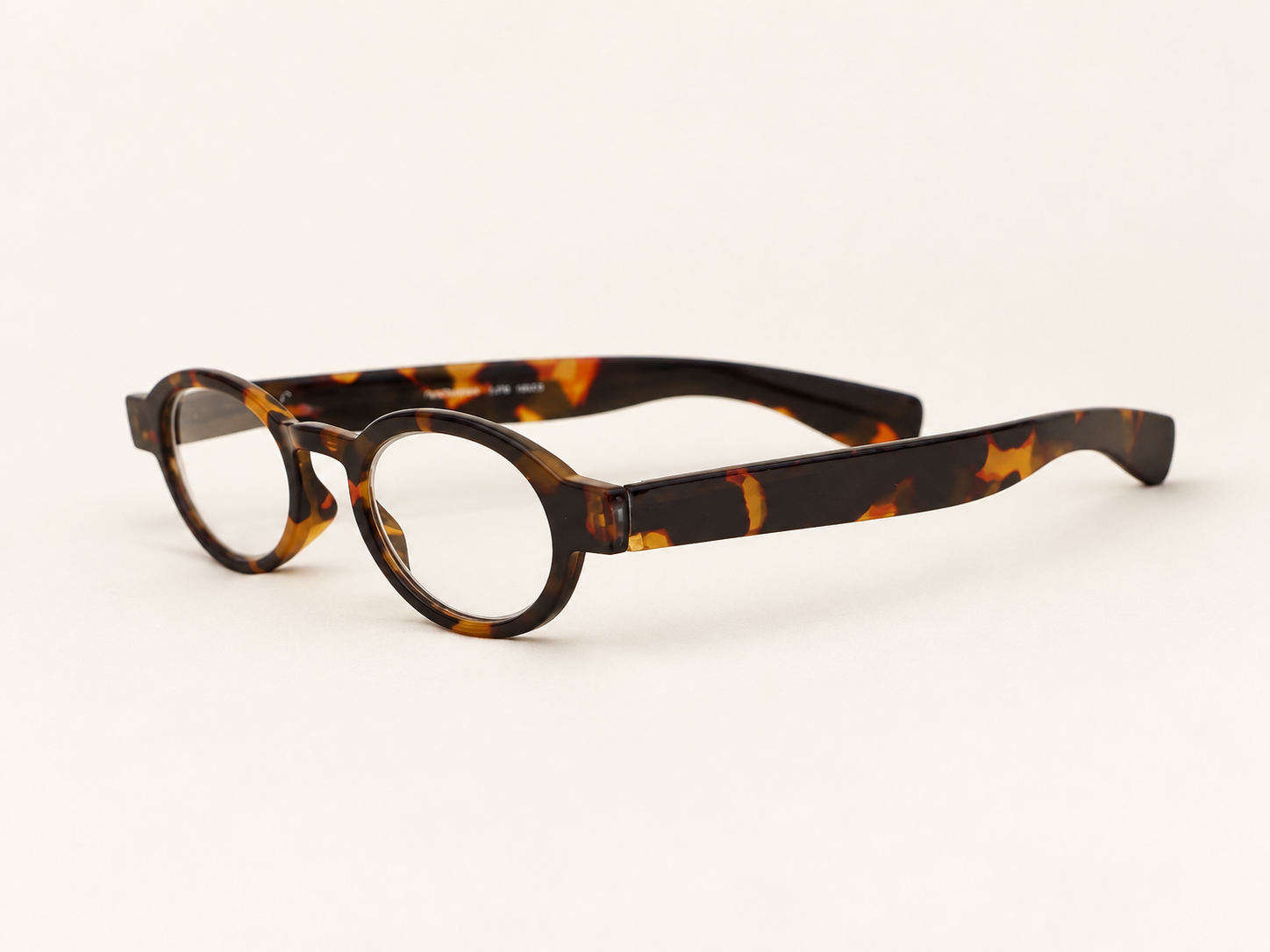 Side view of L40 tortoiseshell reading glasses showing the broad temples and flex hinge