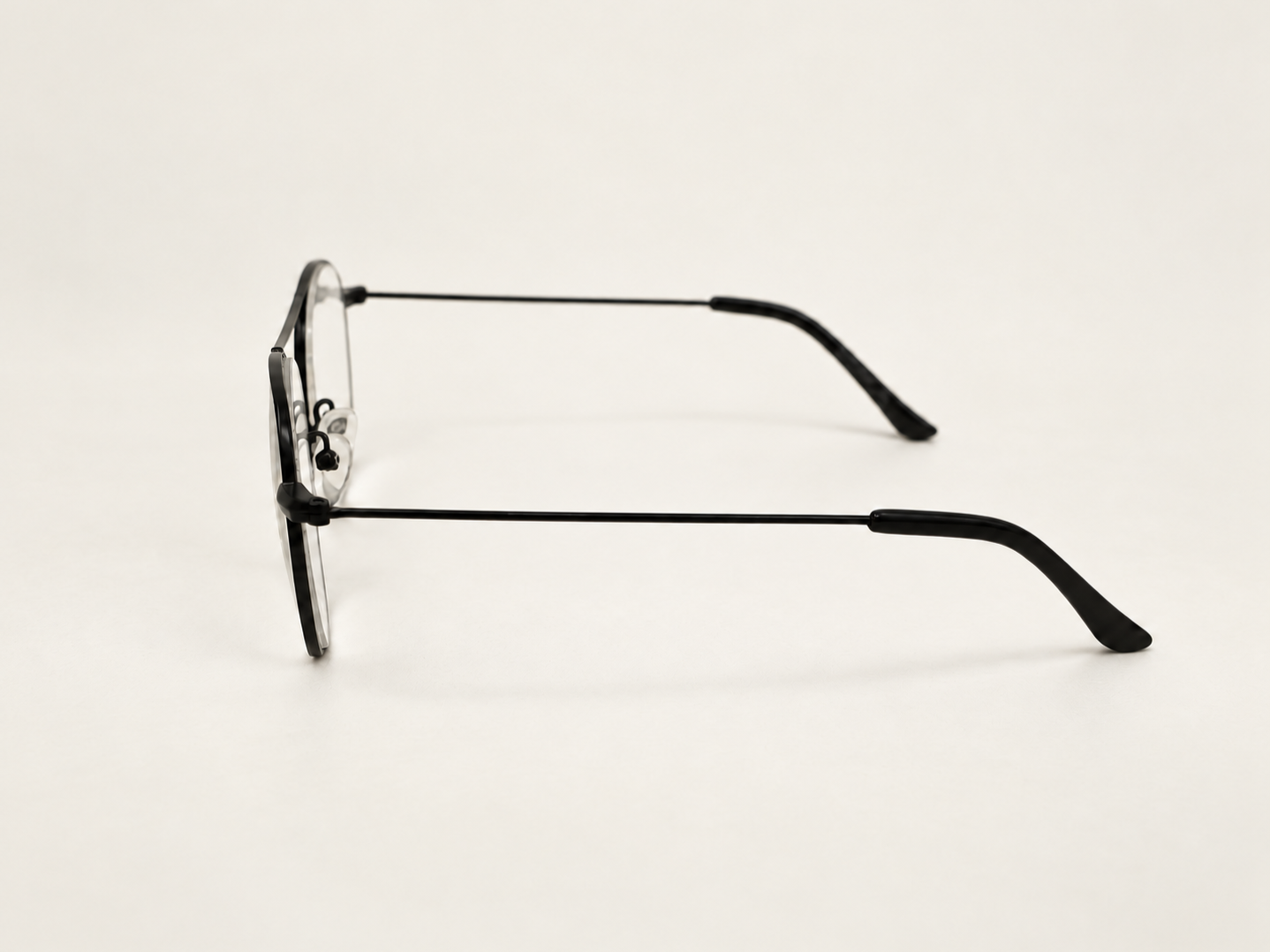 Side view of Dylan black aviator reading glasses with slender arms and curved tips