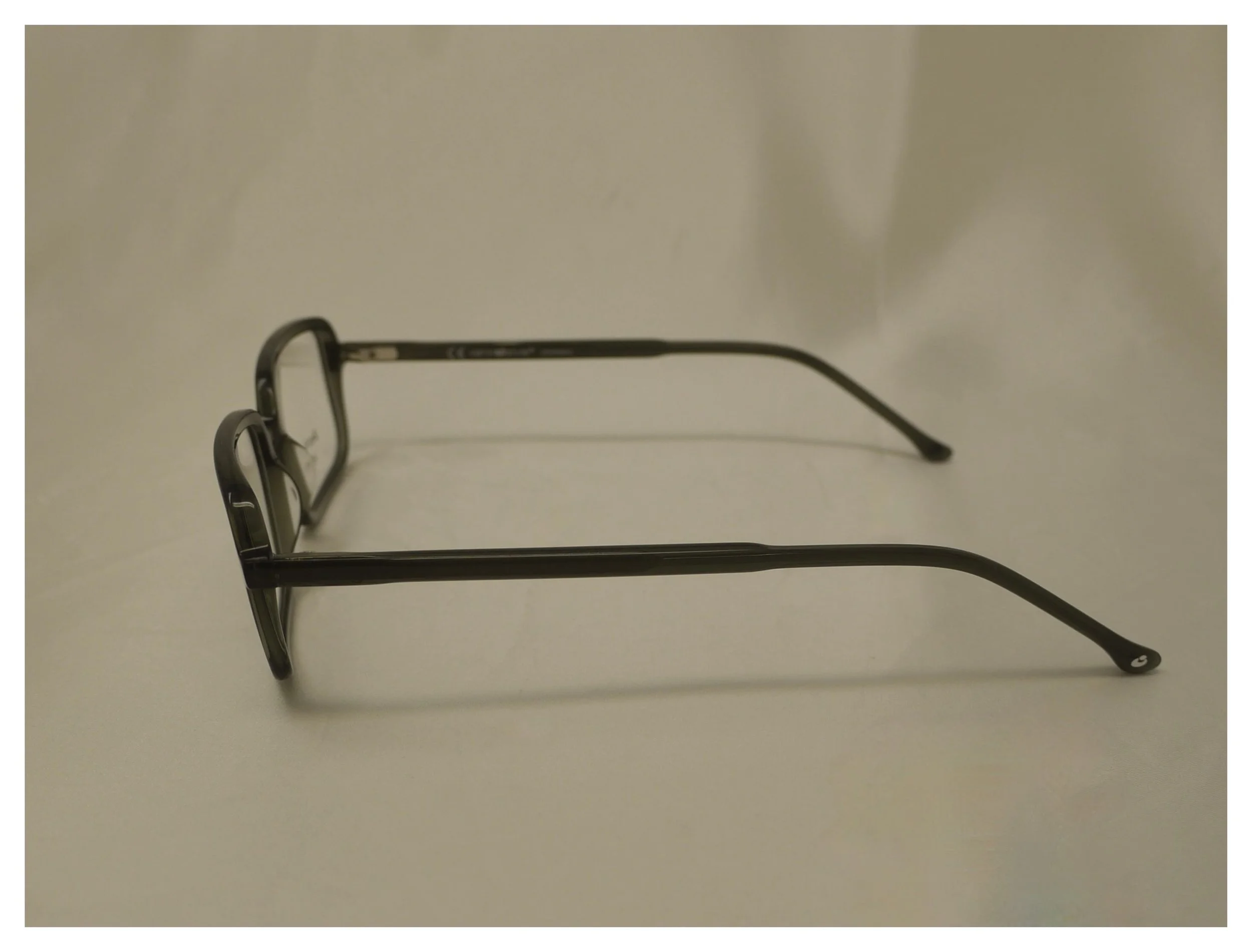 Side profile view of the bespoke F0641 dark green reading glasses, showing the temple and hinge detail