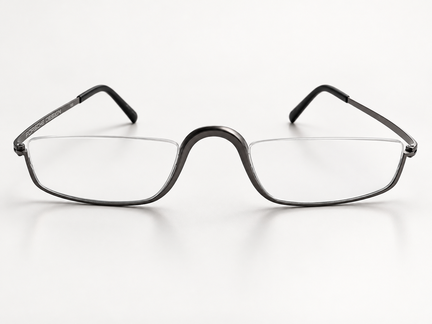 Front view of Porsche Design P8002-C gunmetal reading glasses with open upper lens edges