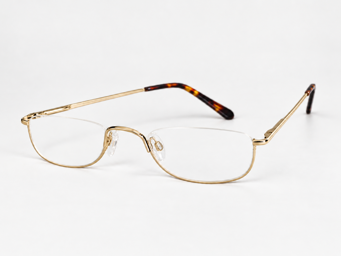 B-AQ gold half-eye reading glasses with clear nose pads and tortoiseshell temple tips, shown from a slight front angle