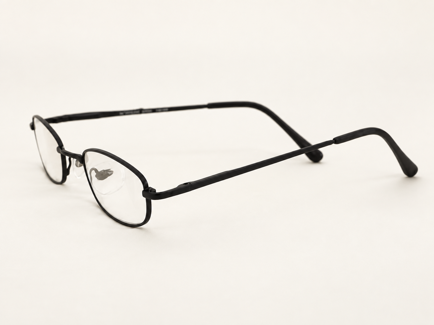 Side view of C-2204 black metal pocket clip reading glasses showing the slim temples and curved tips