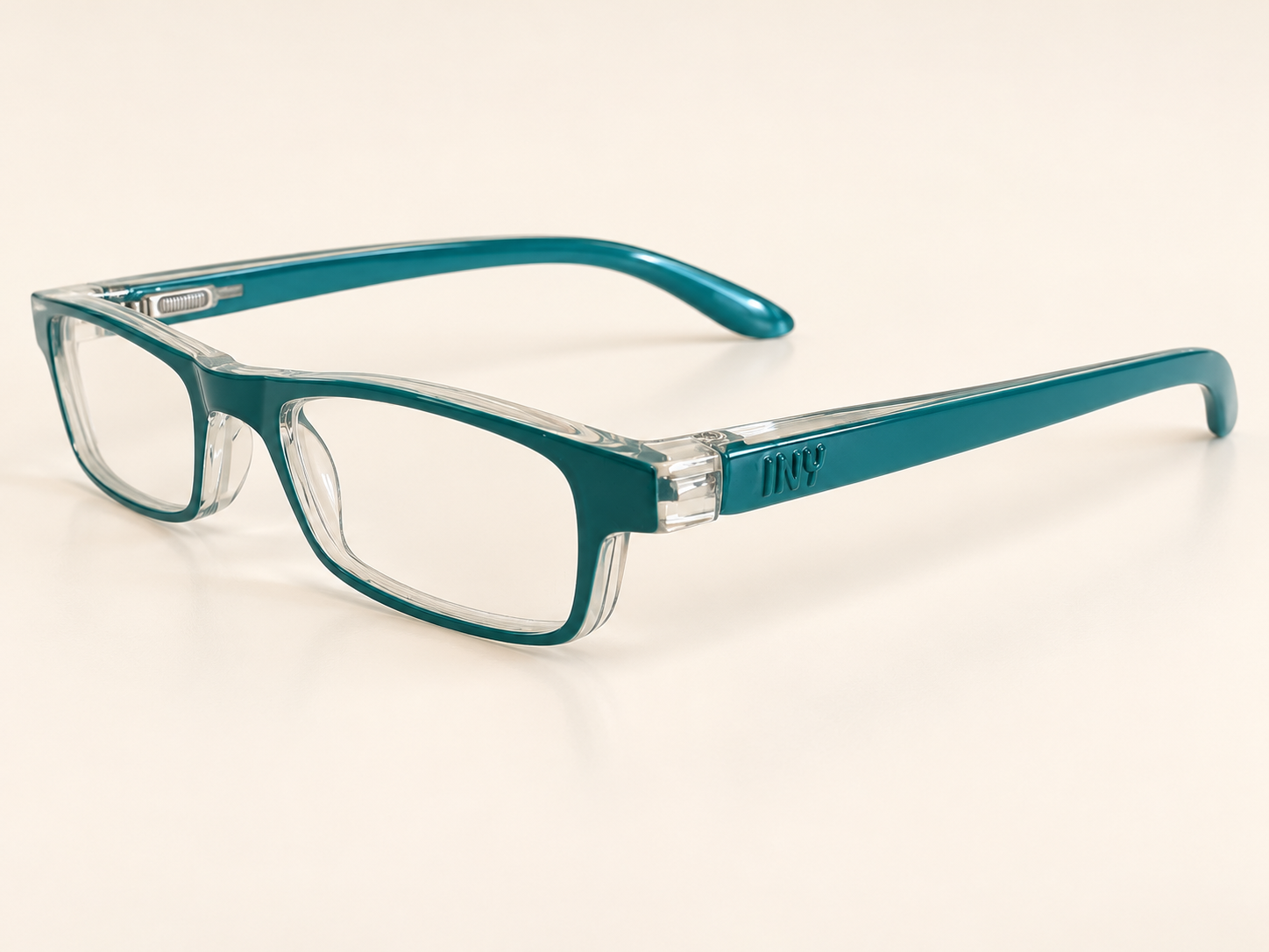 Angled view of Zipper teal reading glasses showing the clear sides and spring hinges