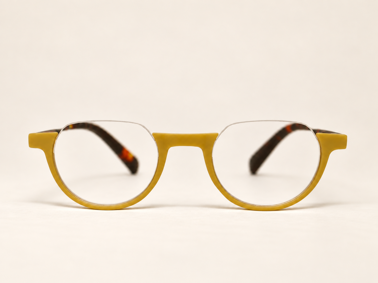 Front view of Ikaly Copenhagen blue light reading glasses in pastel yellow and tortoiseshell
