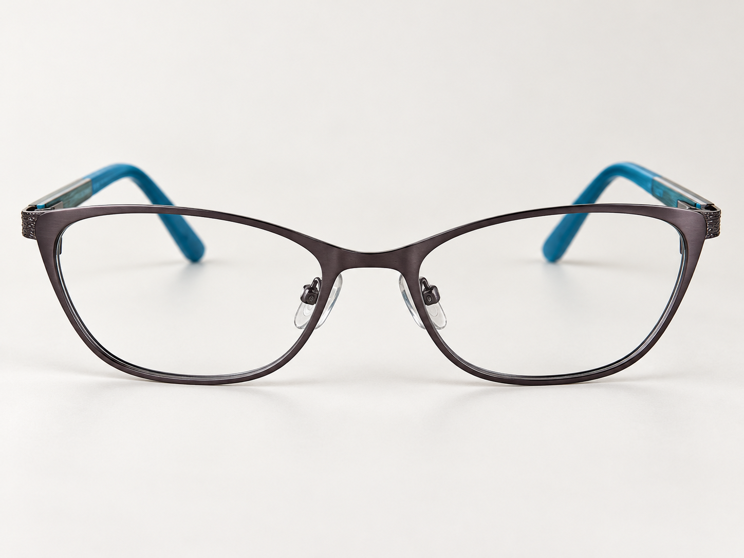Front view of OMG! 6030 C3 cat-eye reading glasses with a dark metallic front and teal arms