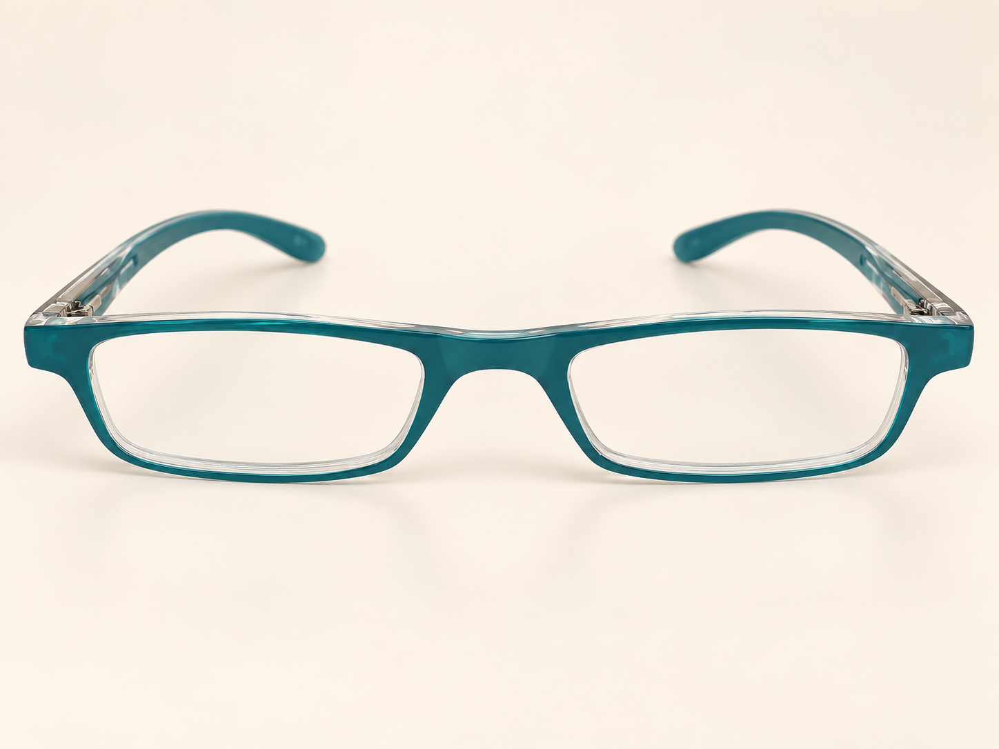Front view of Zipper teal rectangular reading glasses with clear frame edges