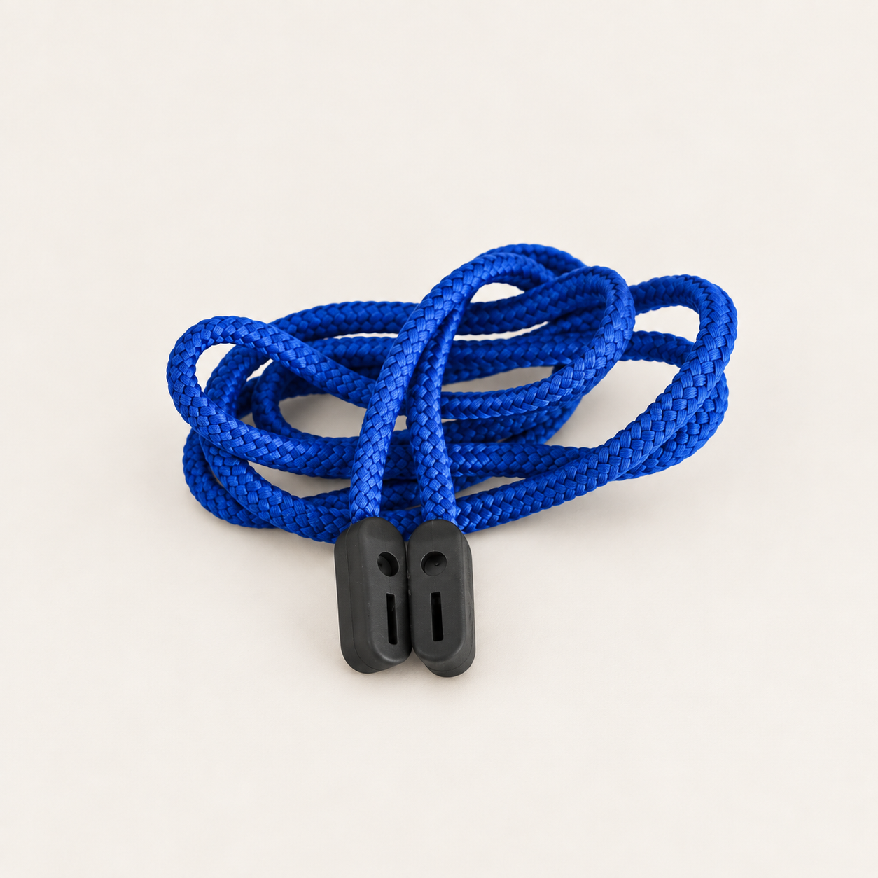 Blue braided glasses cord in loose loops with two black rubber grip ends