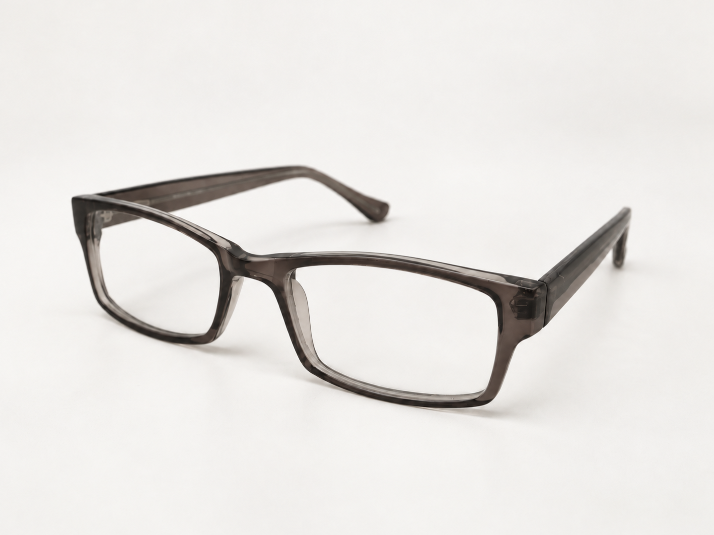 Angled view of Sicily reading glasses showing the translucent charcoal grey frame