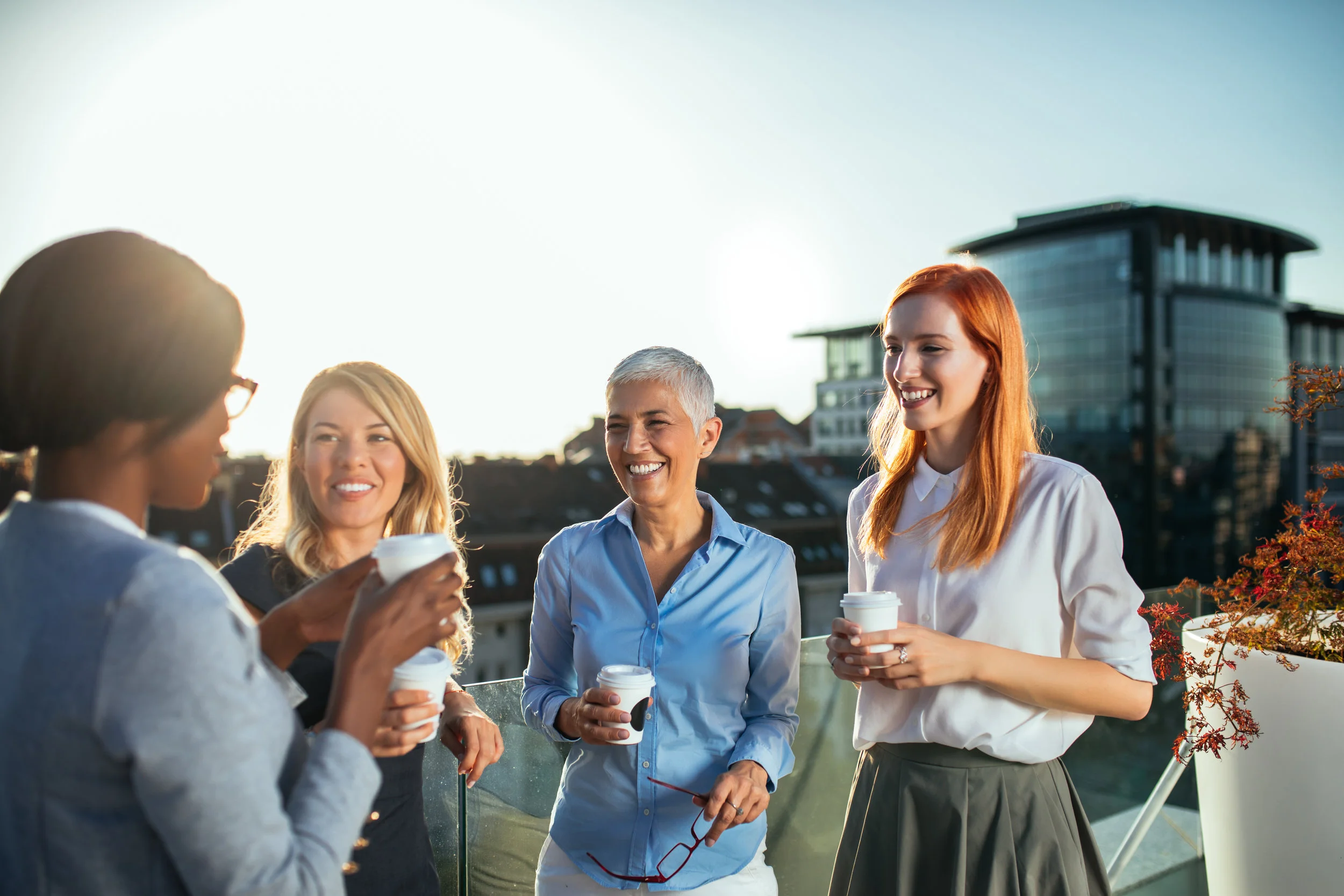 colleagues having coffee on the roof.jpeg