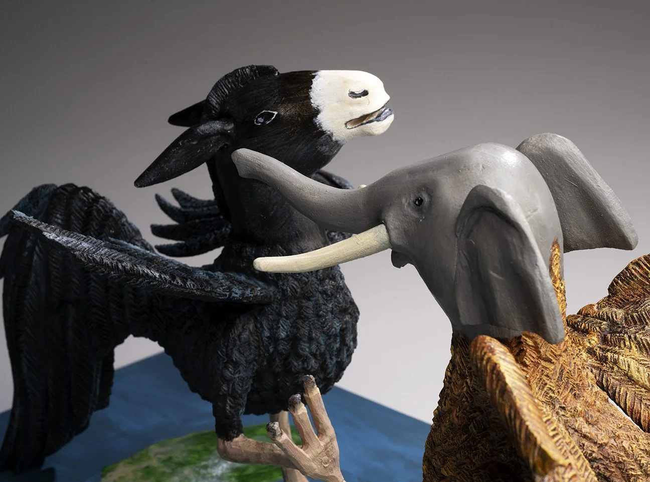   Cock Fight  (detail), 2022. Carved and painted wood, 10 x 22¾ x 11 in. Collection of Mr. and Mrs. H. Earl Hoover II. Photo © James Hart. 