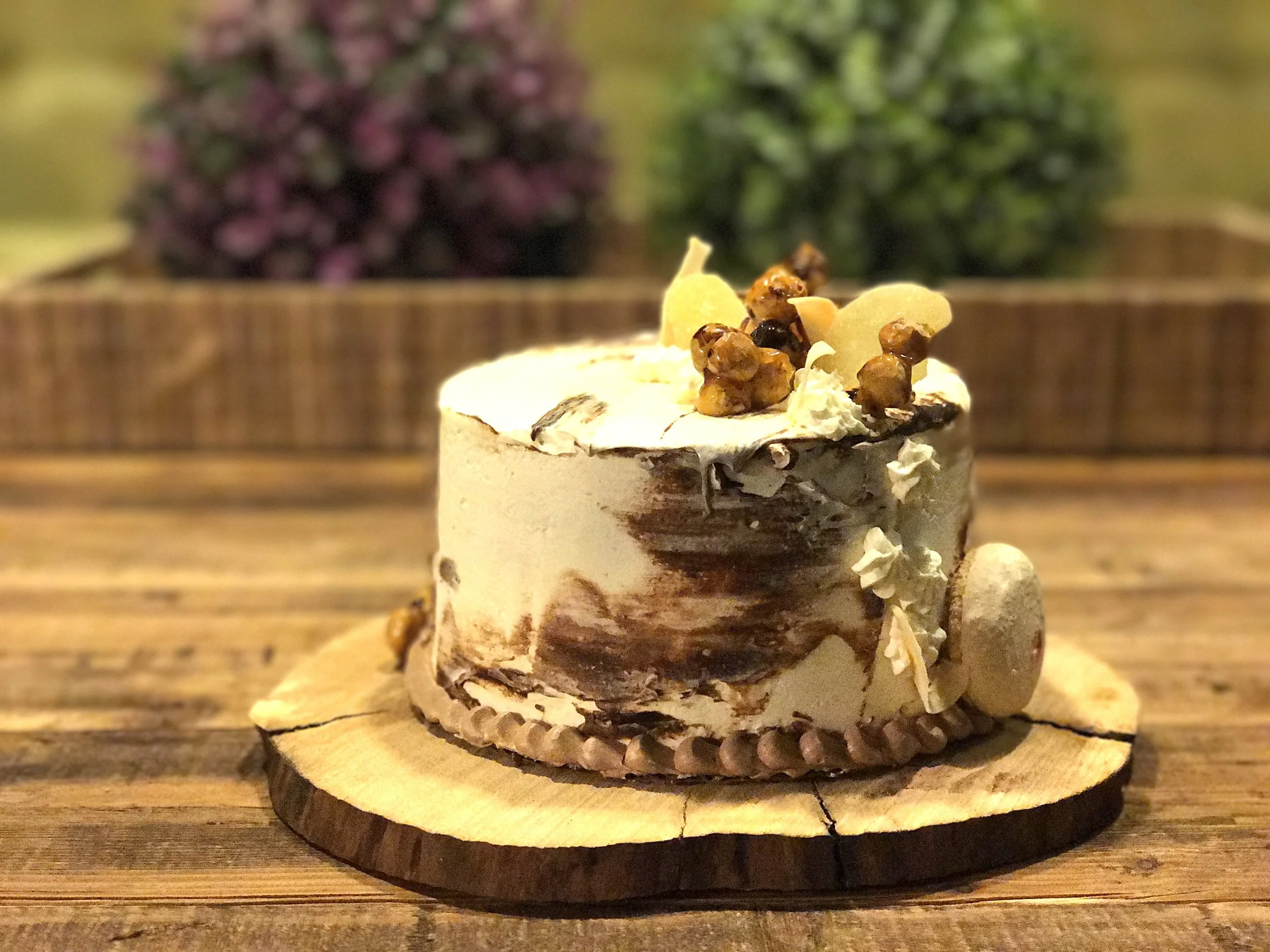 Brown butter cake with vanilla, caramel, candied hazelnut, ginger and mexican chocolate