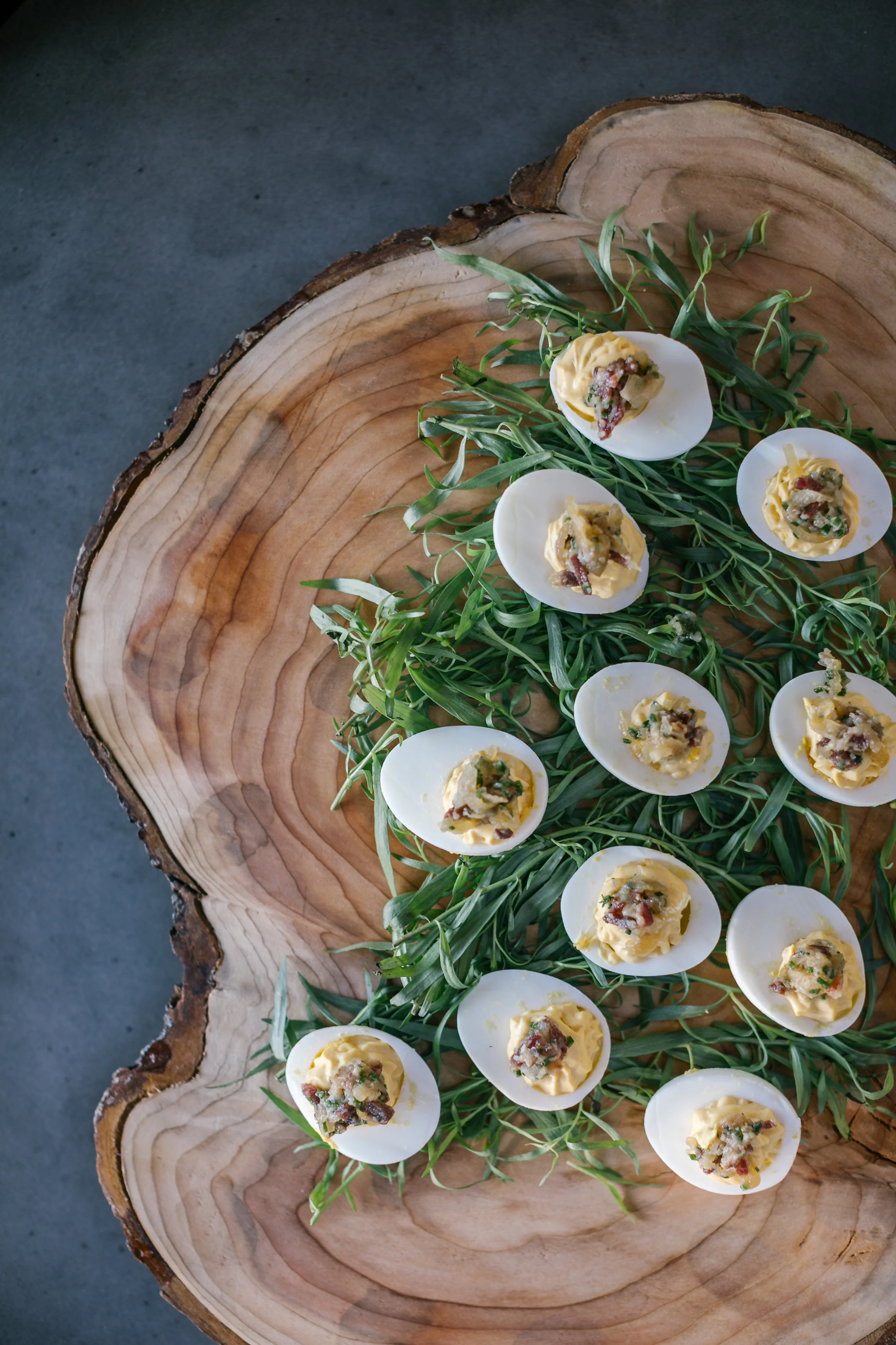 Deviled eggs with a maple, prosciutto jam