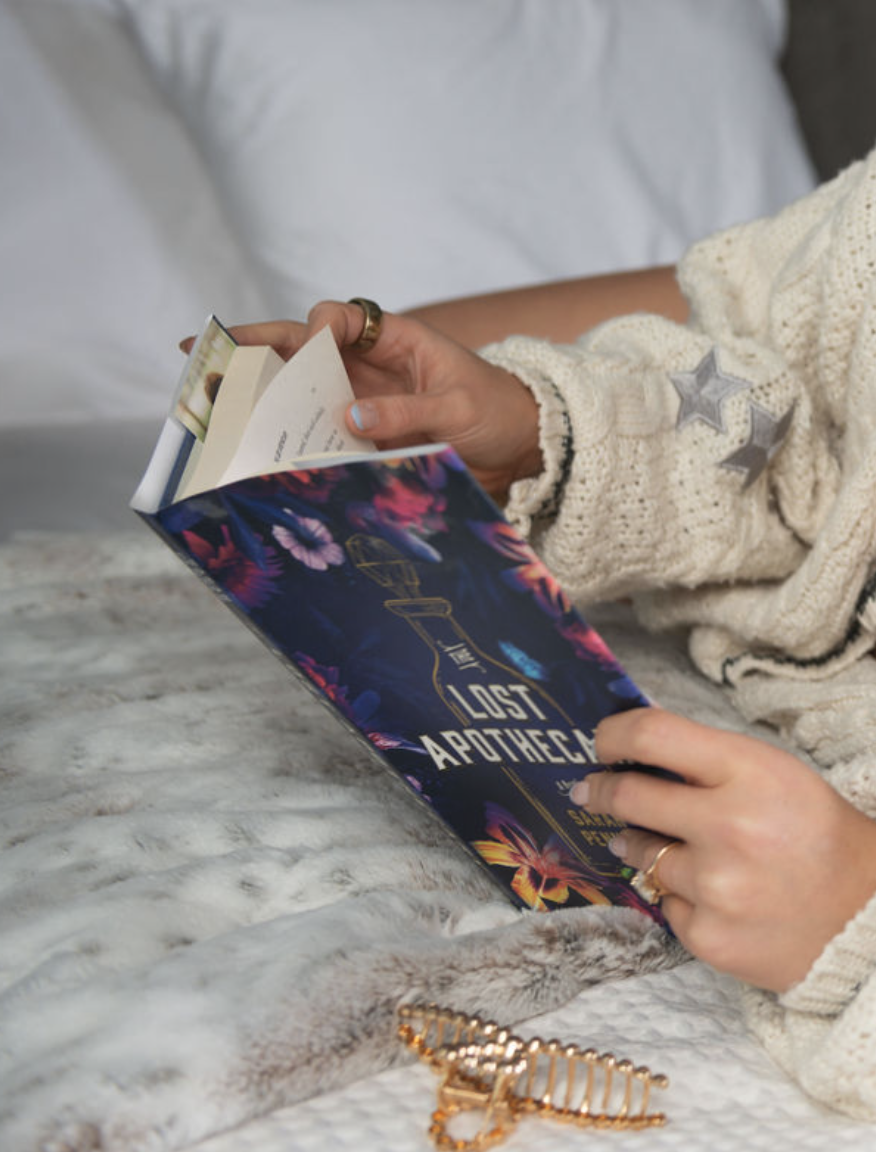 Dallas boudoir photographer capturing book lover themed session2.png
