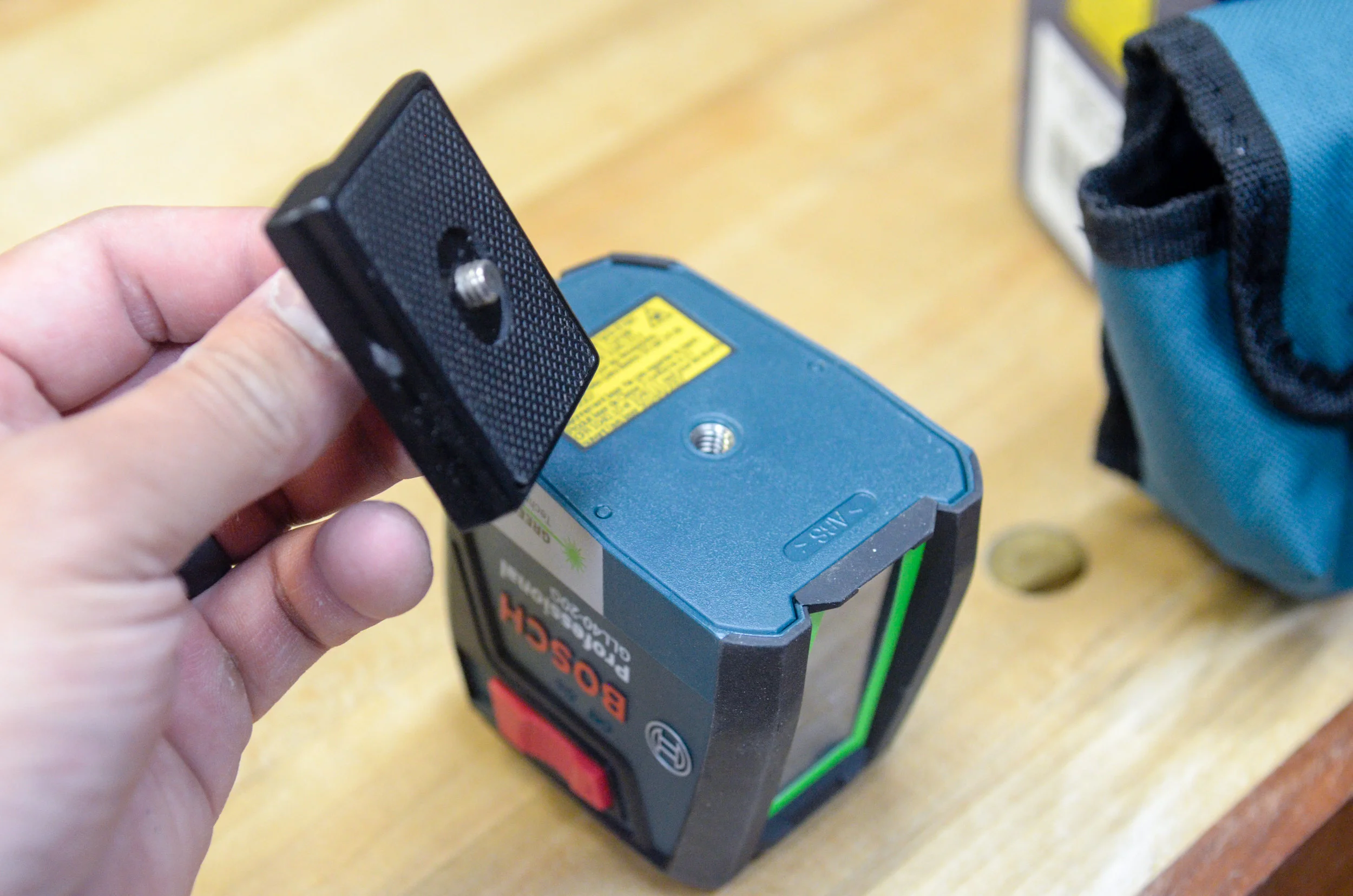 1/4”-20tpi threads accept a camera tripod bracket.