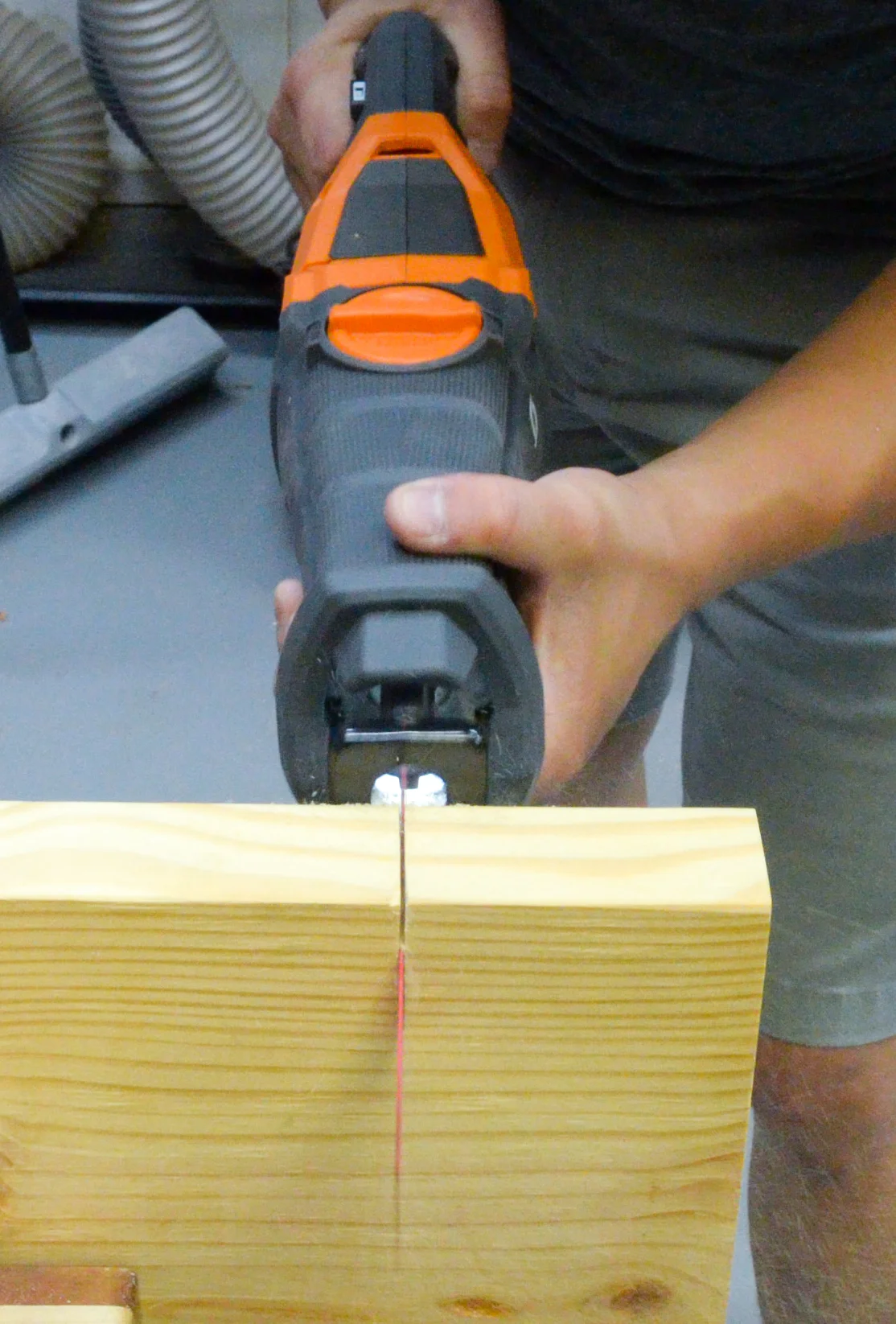 In orbital mode, the Ridgid OCTANE reciprocating saw makes quick work of wood materials.