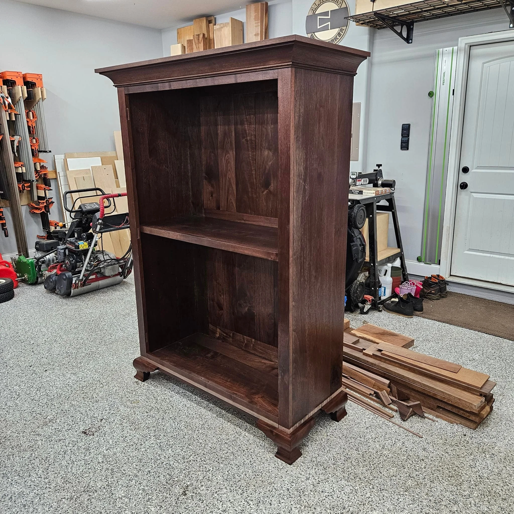 I was able to fit the carved bracket foot assembly to the china cabinet. I need to add some cove molding, and then finally set the glass in the French doors. I'm so close to the finish line. 
#alabamawoodworker #finewoodworking #tradesman #woodworkin